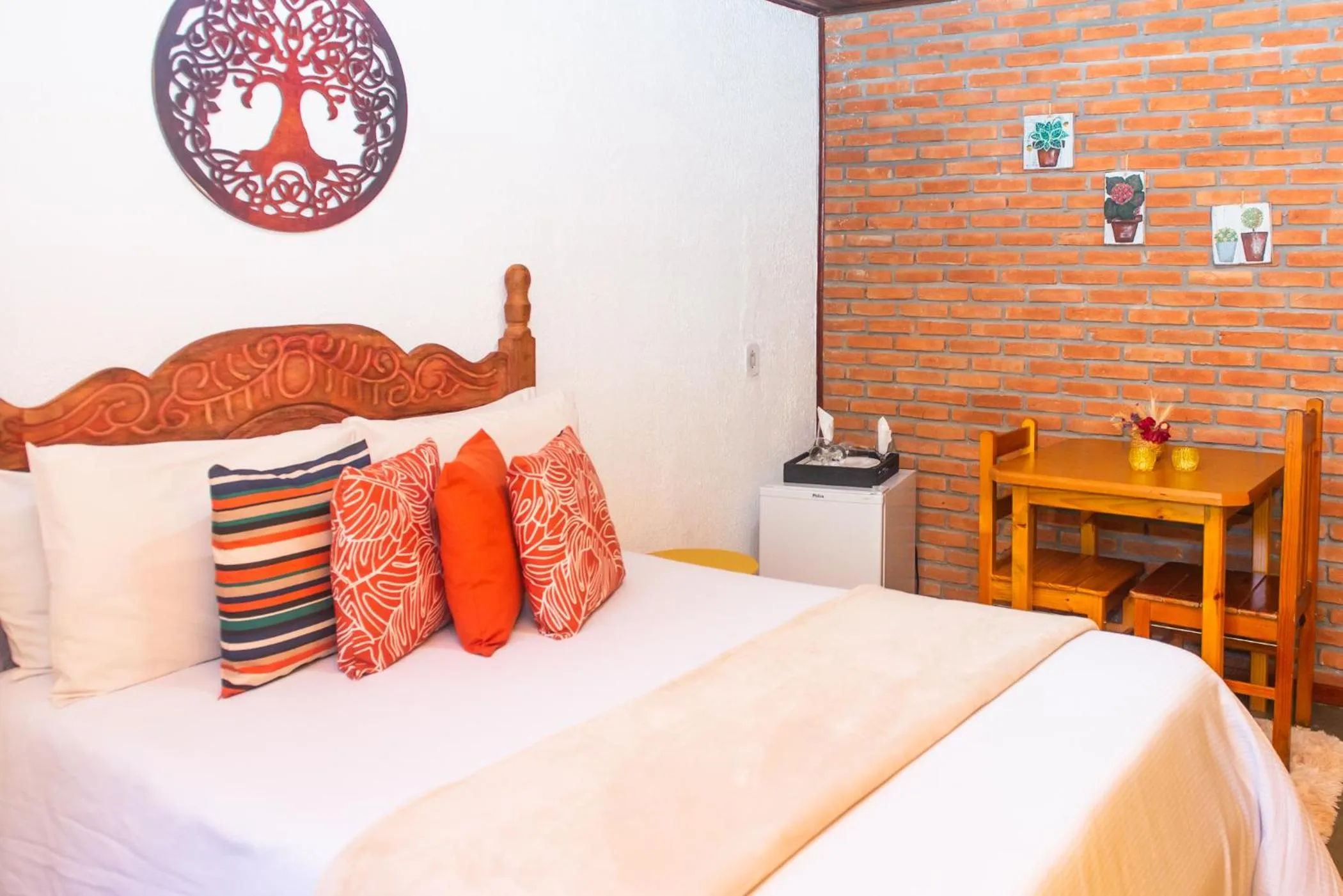 Bed in Chalés Recanto da cachoeira