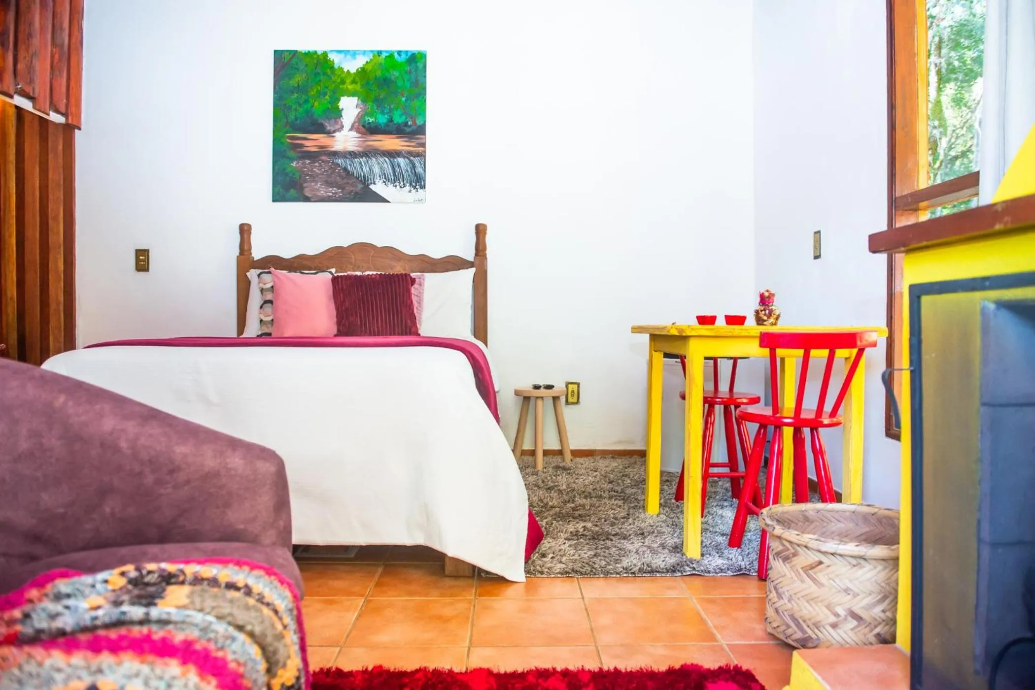 Bed in Chalés Recanto da cachoeira