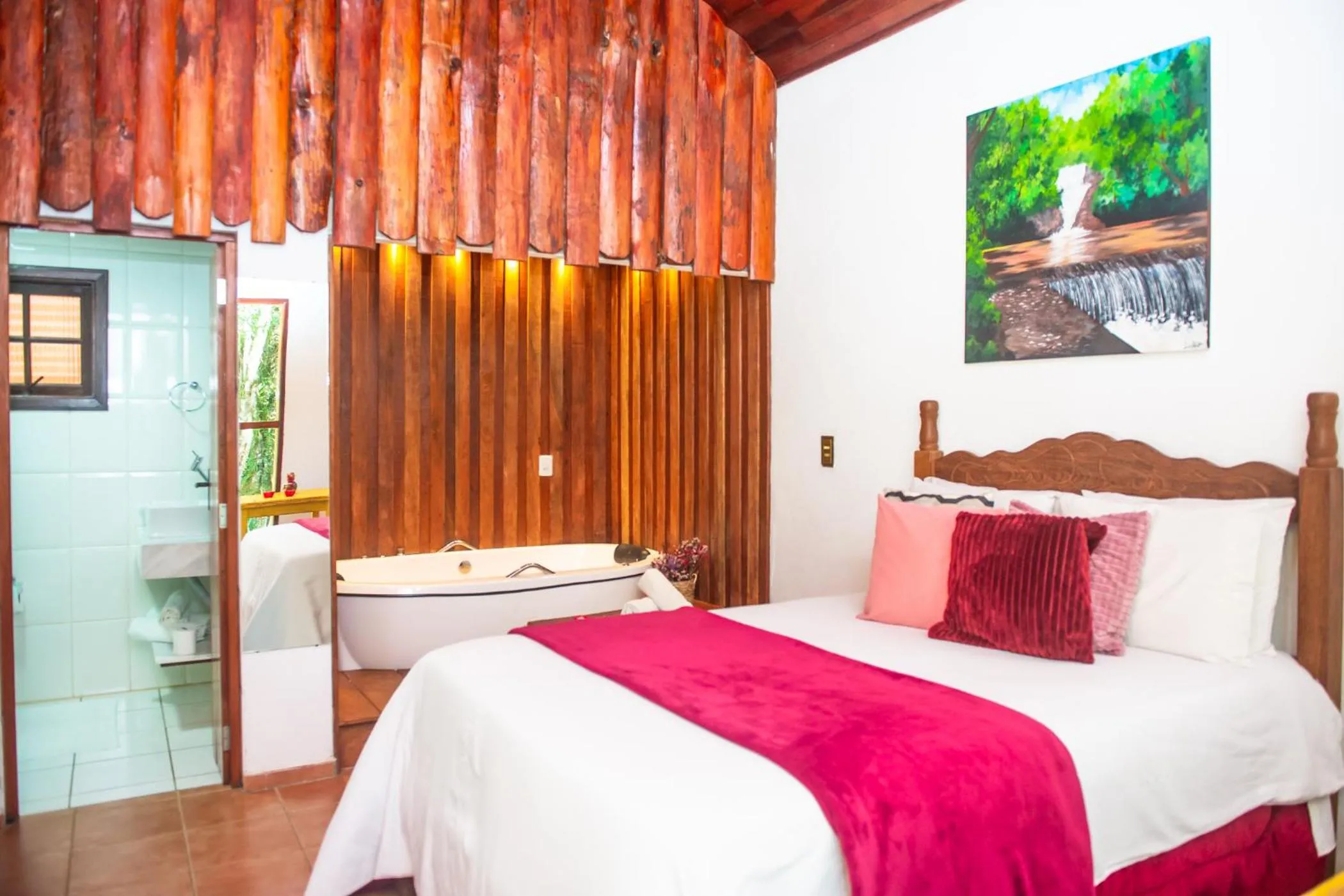 Bed in Chalés Recanto da cachoeira