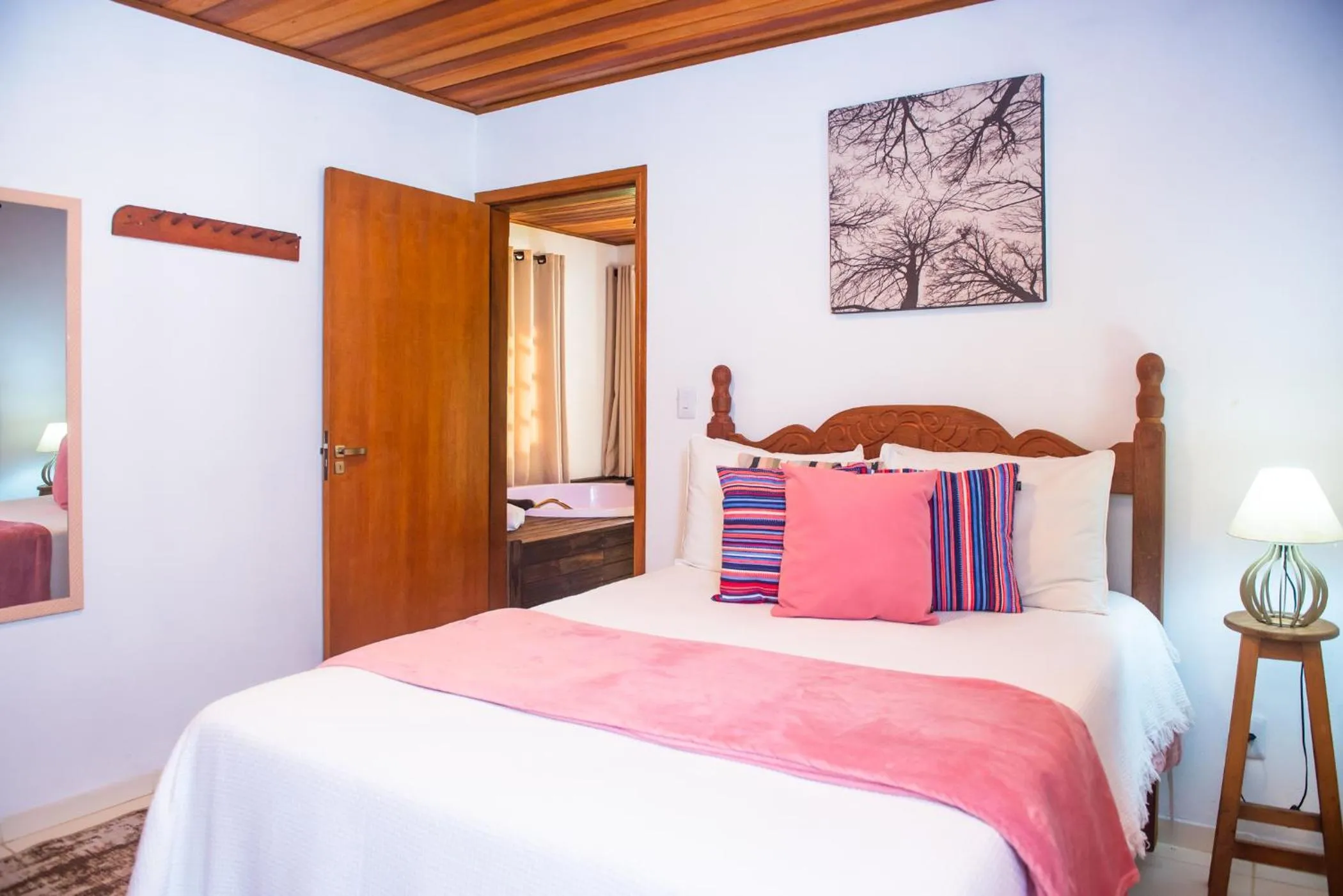 Bed in Chalés Recanto da cachoeira