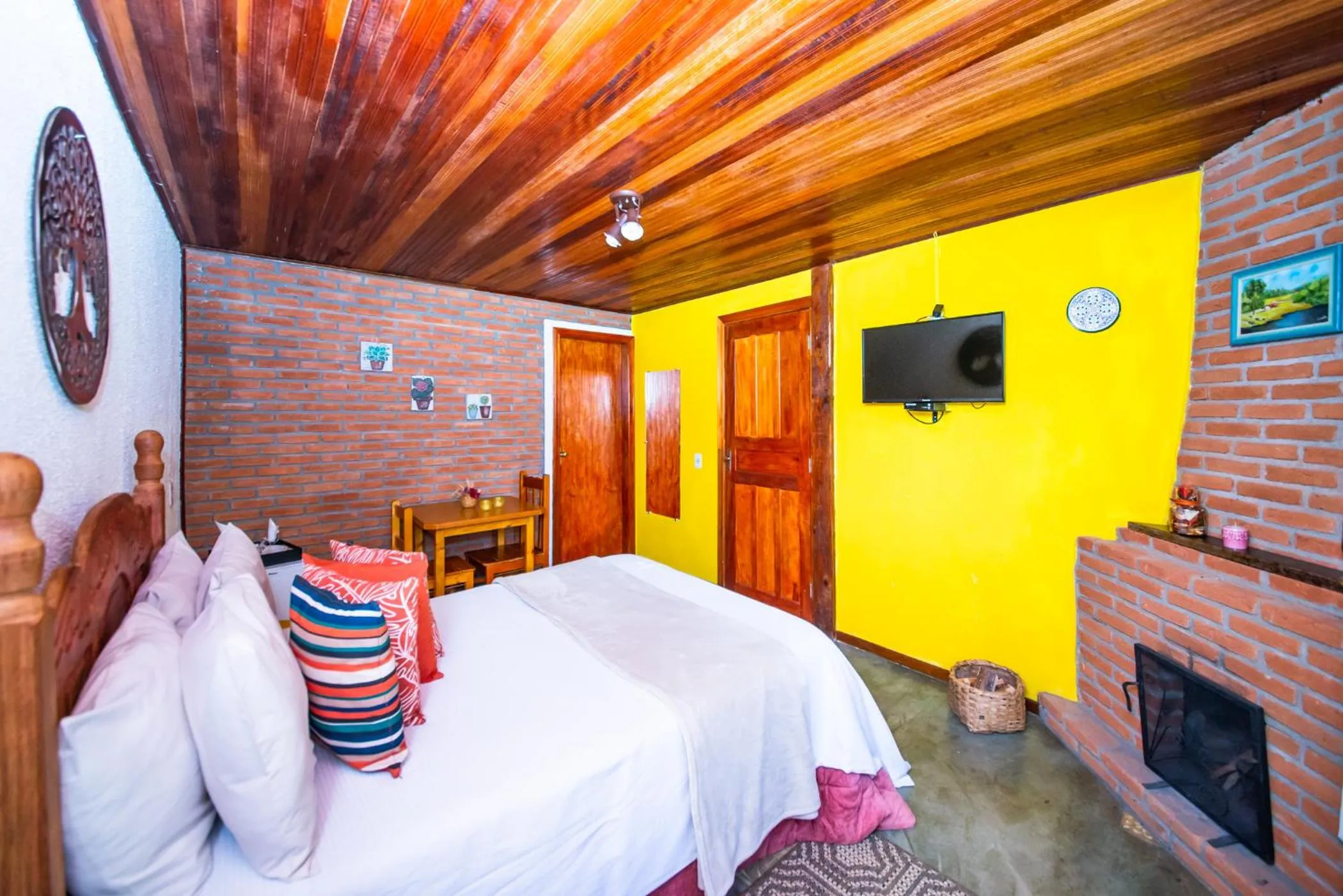 Bed in Chalés Recanto da cachoeira