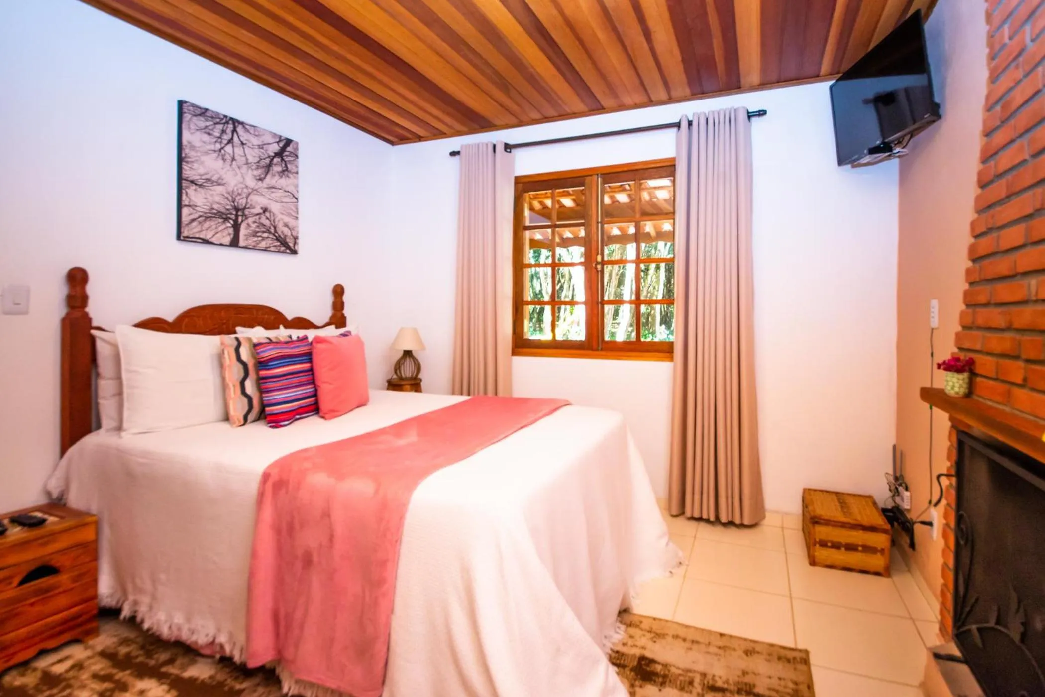 Bed in Chalés Recanto da cachoeira