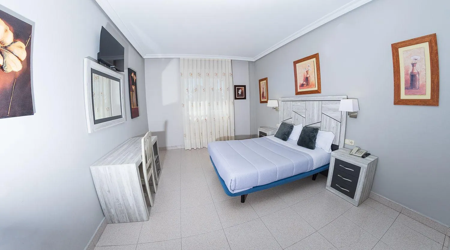 Bed in Hostal El Cruce