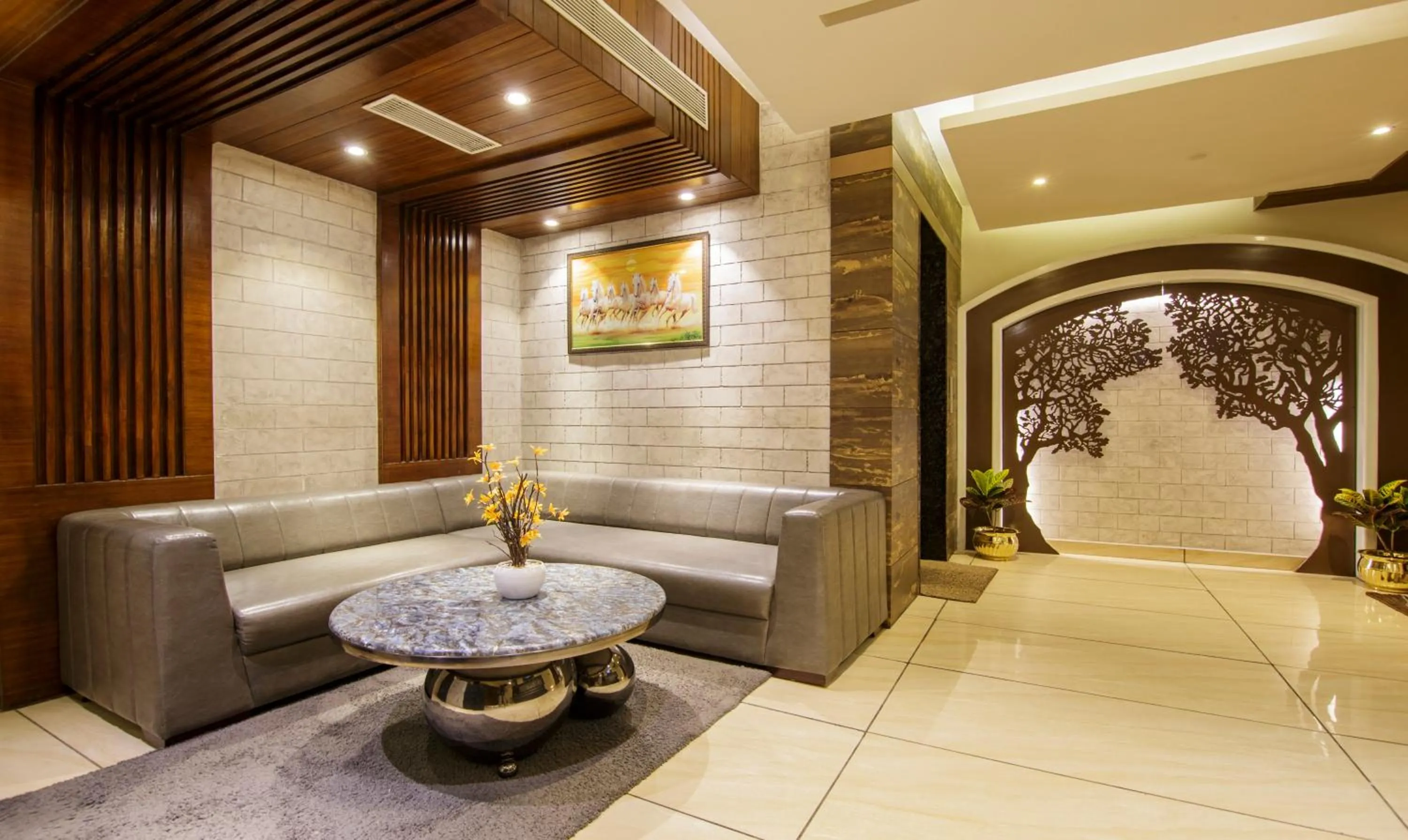 Seating area in Treebo Punjabi Nature Residency, Near Faridabad Railway Station