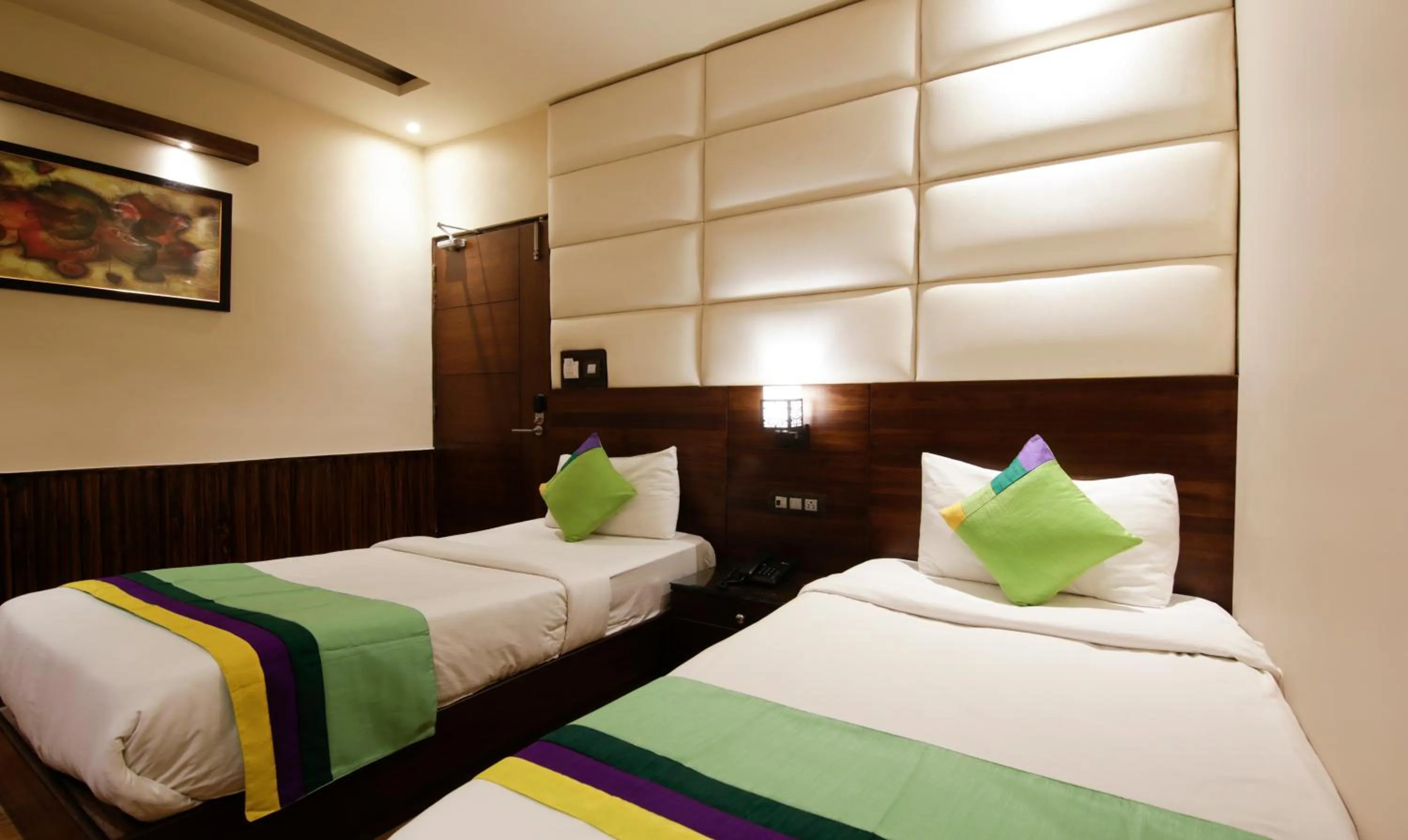 Bed in Treebo Punjabi Nature Residency, Near Faridabad Railway Station