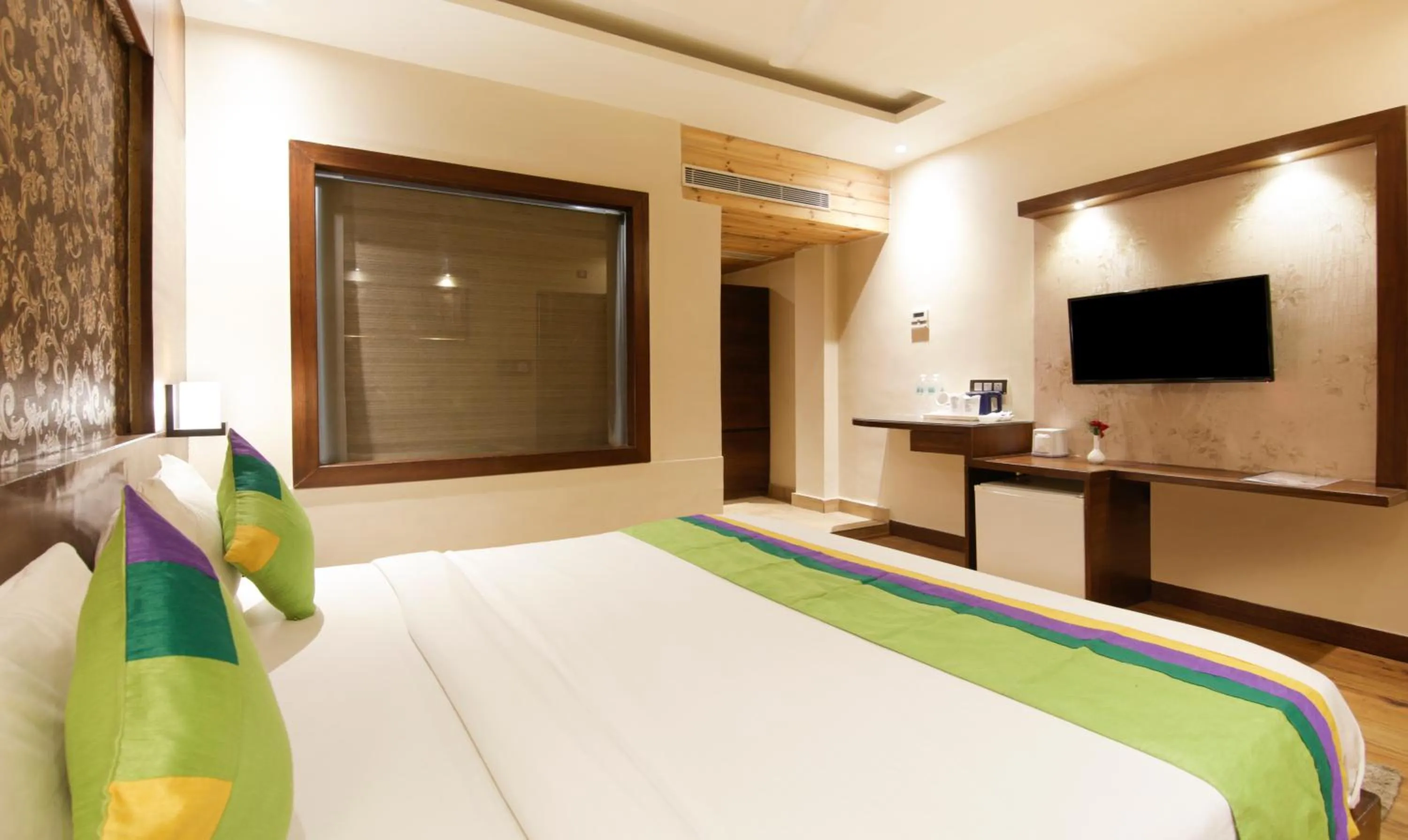 Bed in Treebo Punjabi Nature Residency, Near Faridabad Railway Station