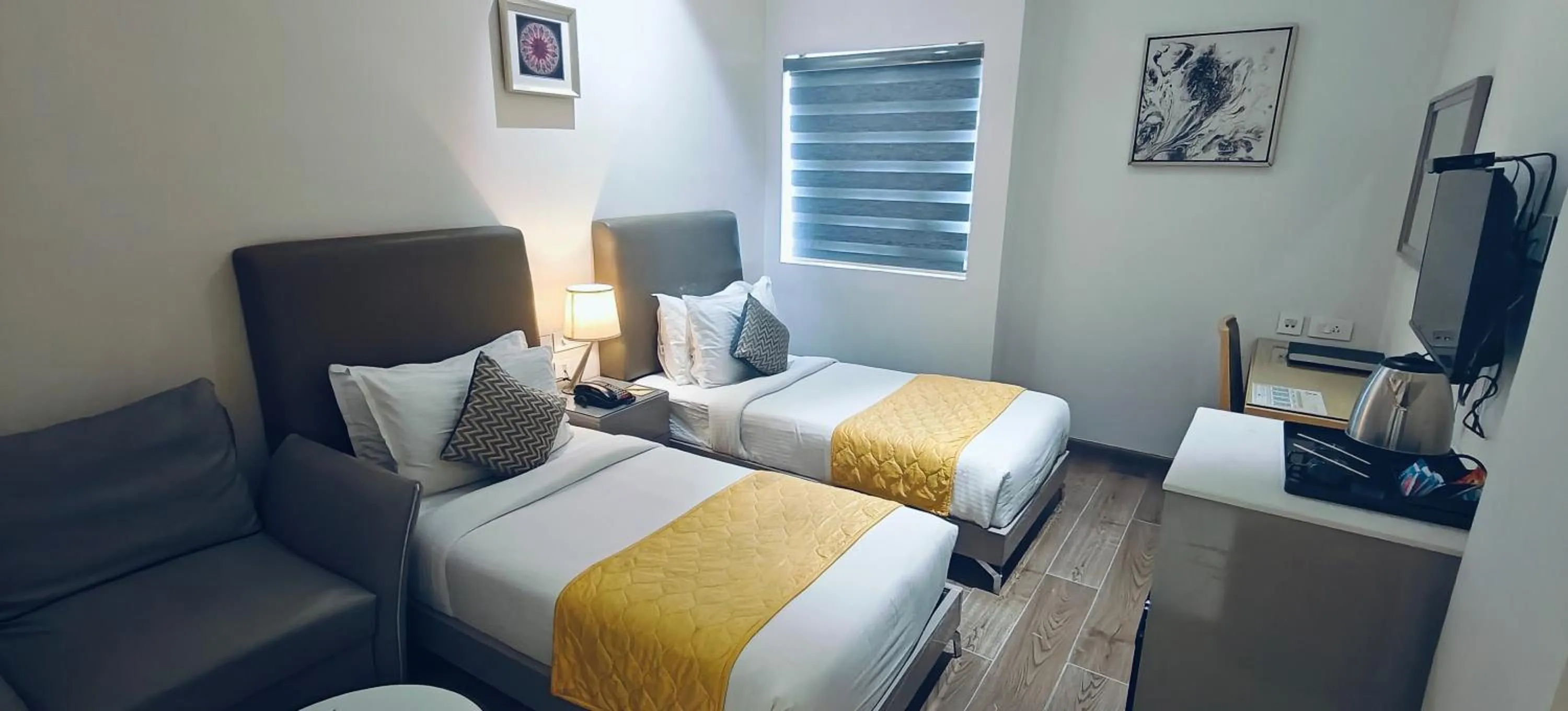 Bed in The Mayberry -A Bergamont Group of Hotels