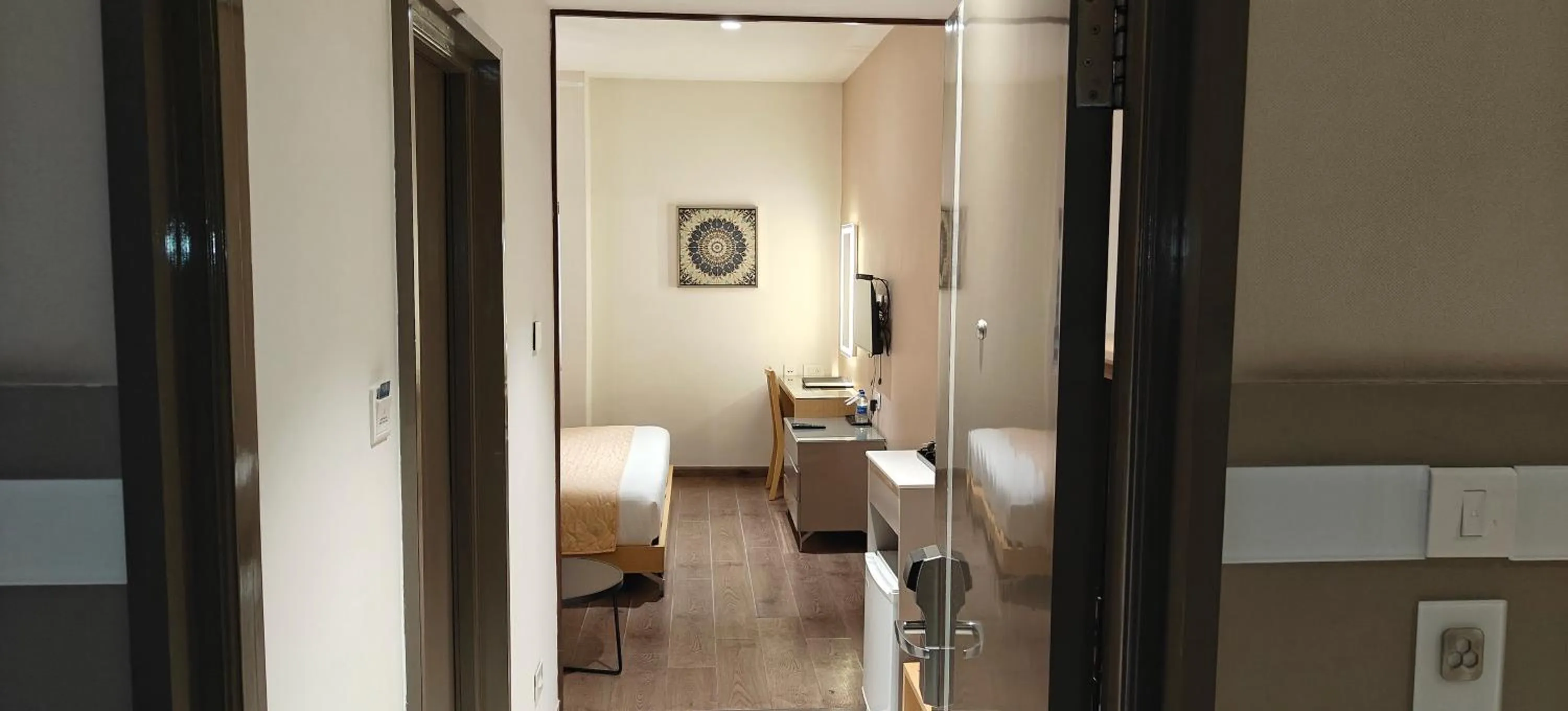 Bed in The Mayberry -A Bergamont Group of Hotels