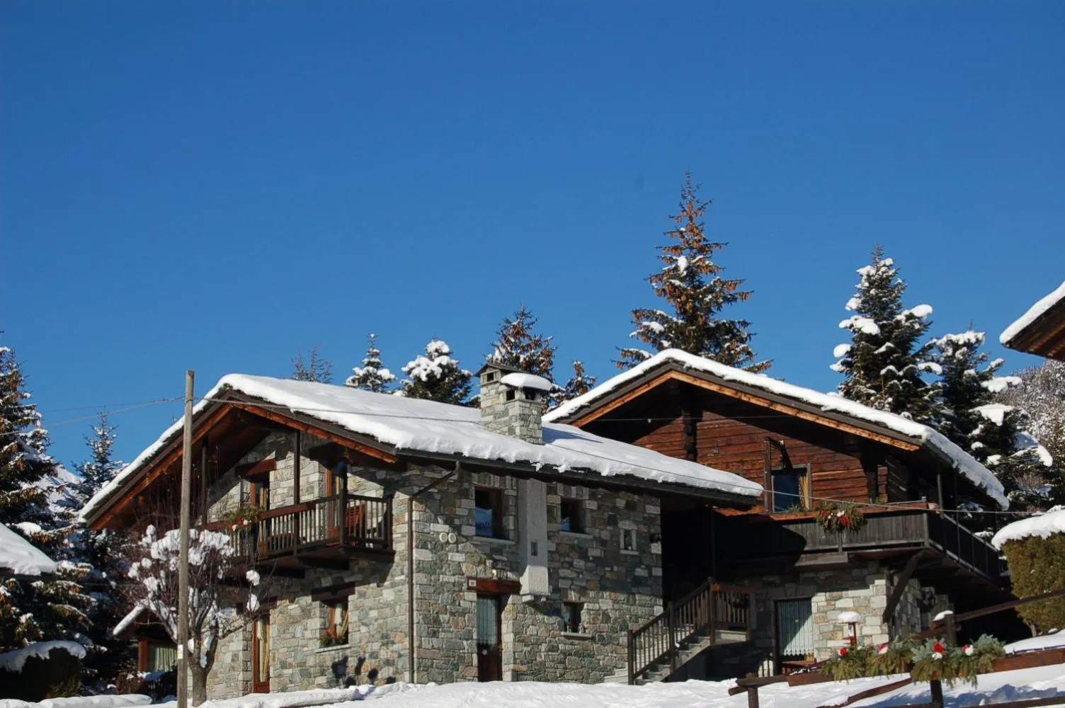 Property building in Aparthotel Foyer d'antan SUITE con caminetto hammam o vasca idromassaggio