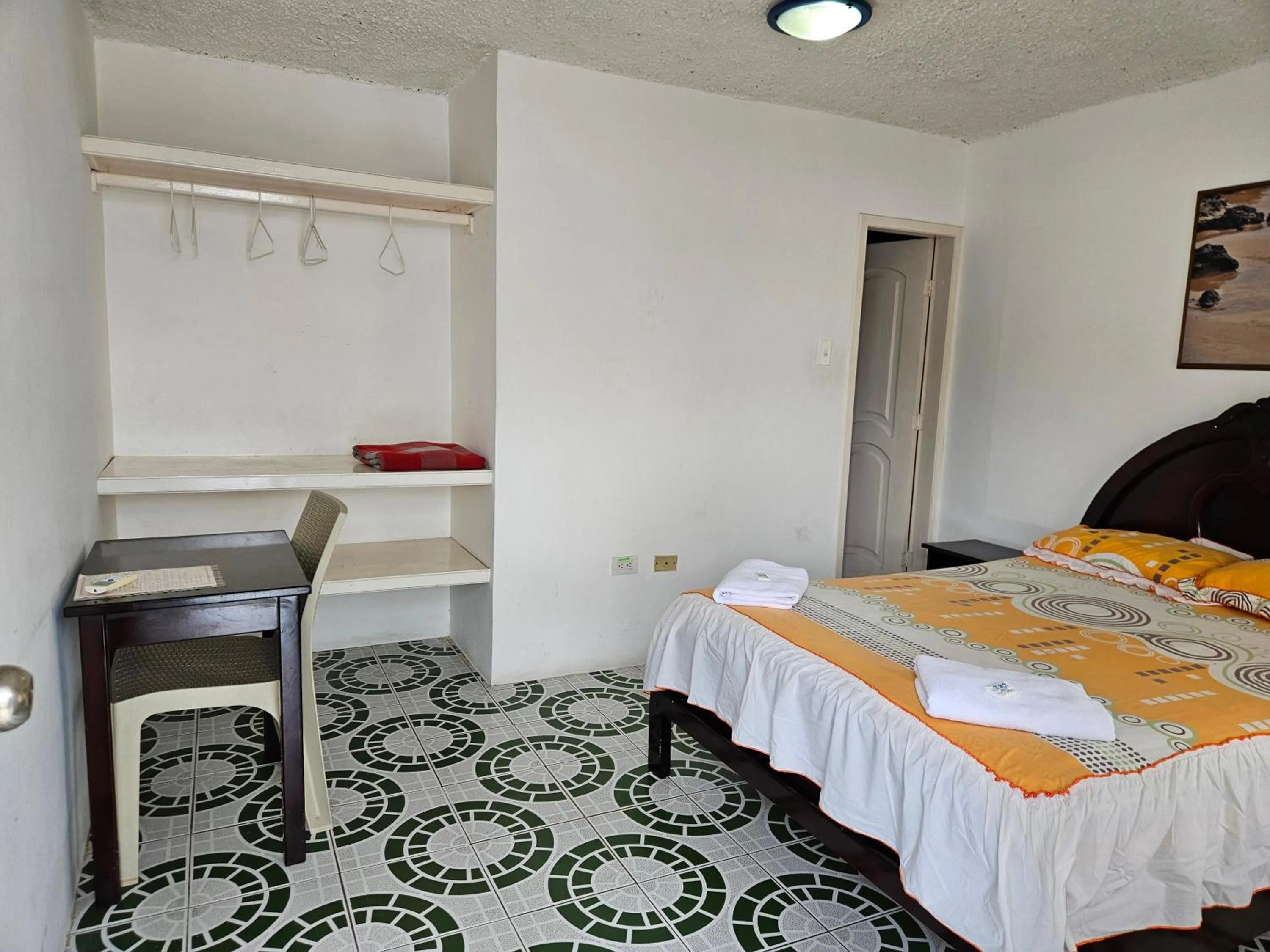 Bedroom, Bed in Hostal Cerro Azul