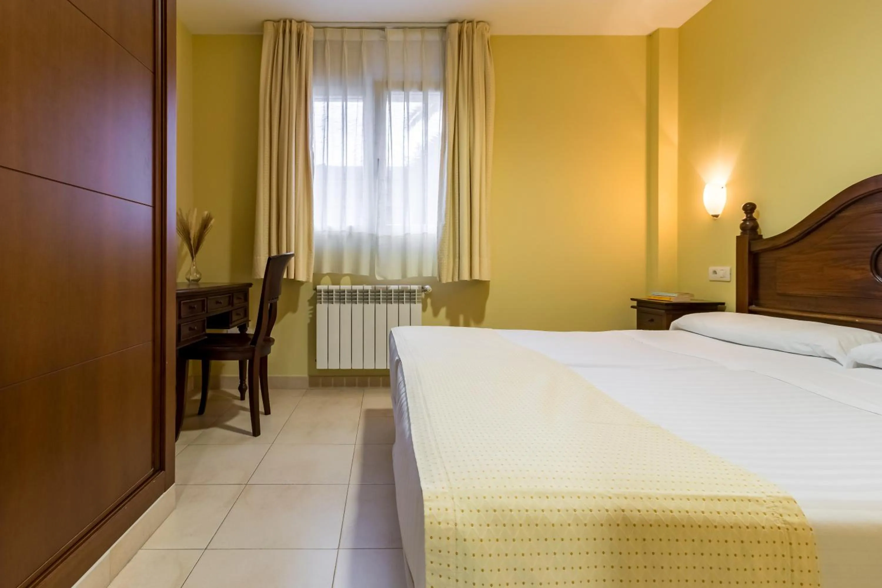 Bed in Apartamentos Silken Playa de Toró