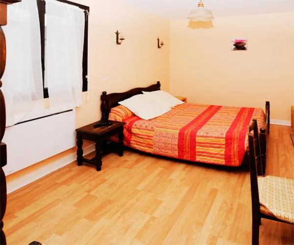 Bed in Hotel Restaurant Maurice