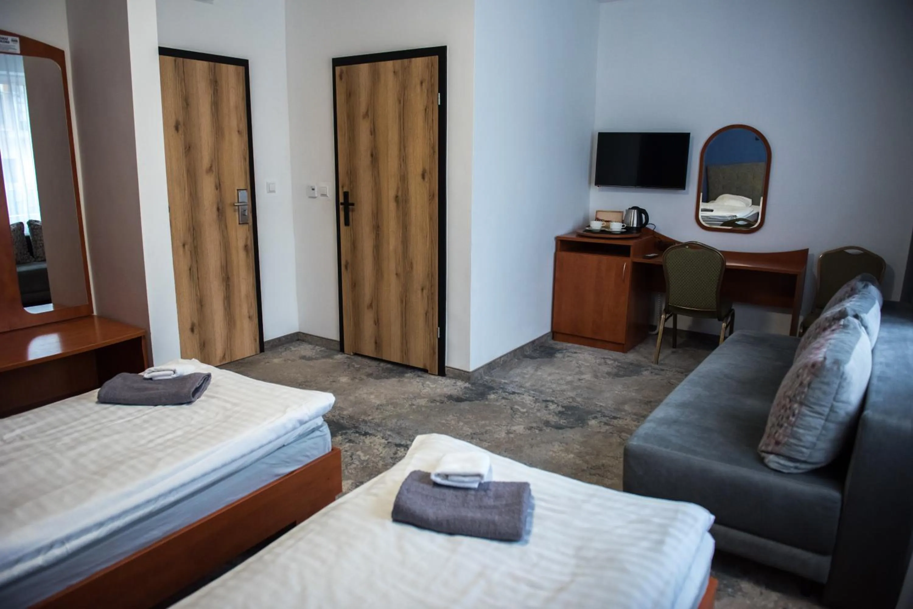 Living room, Bed in Hotel Paradiso