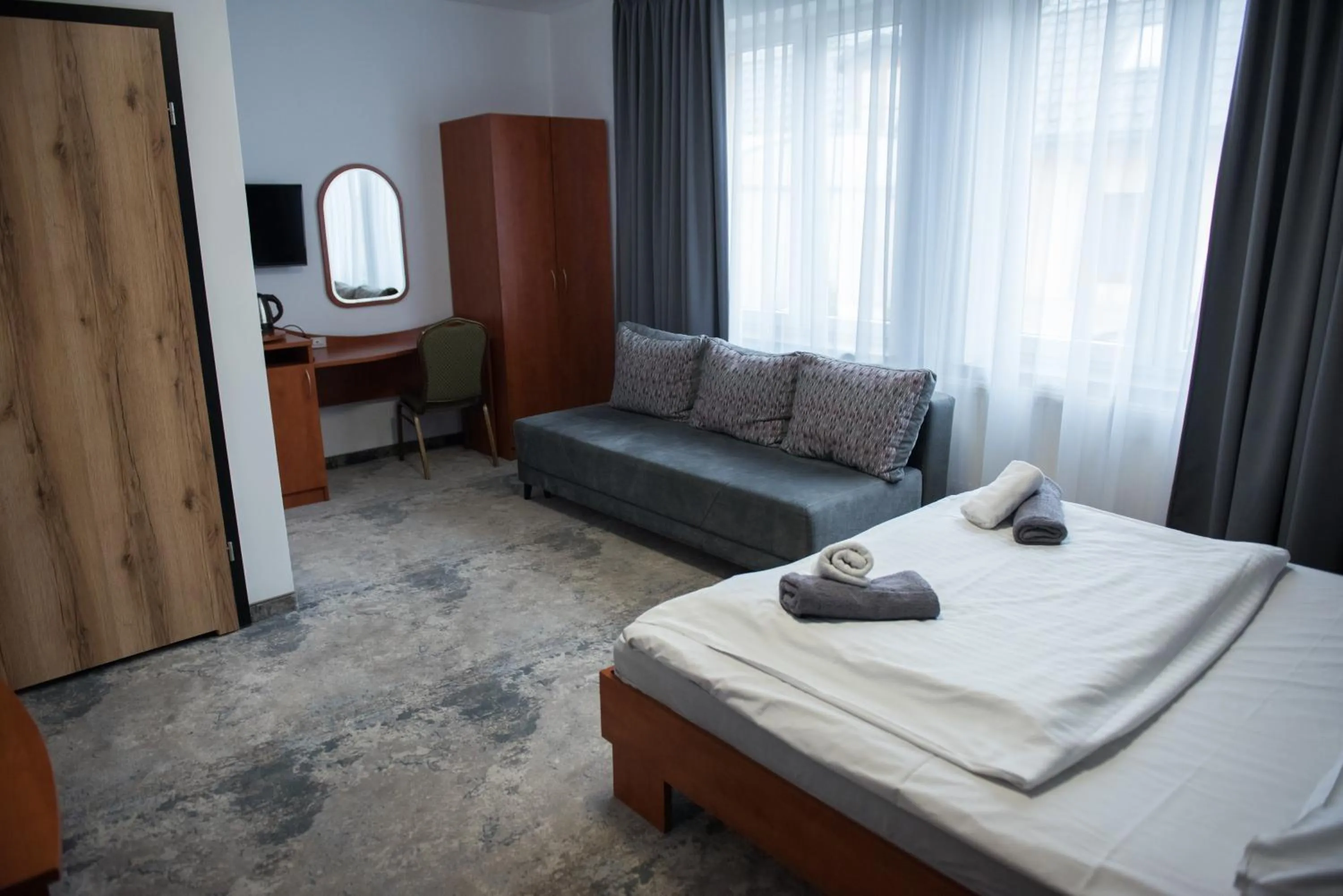 Living room, Bed in Hotel Paradiso