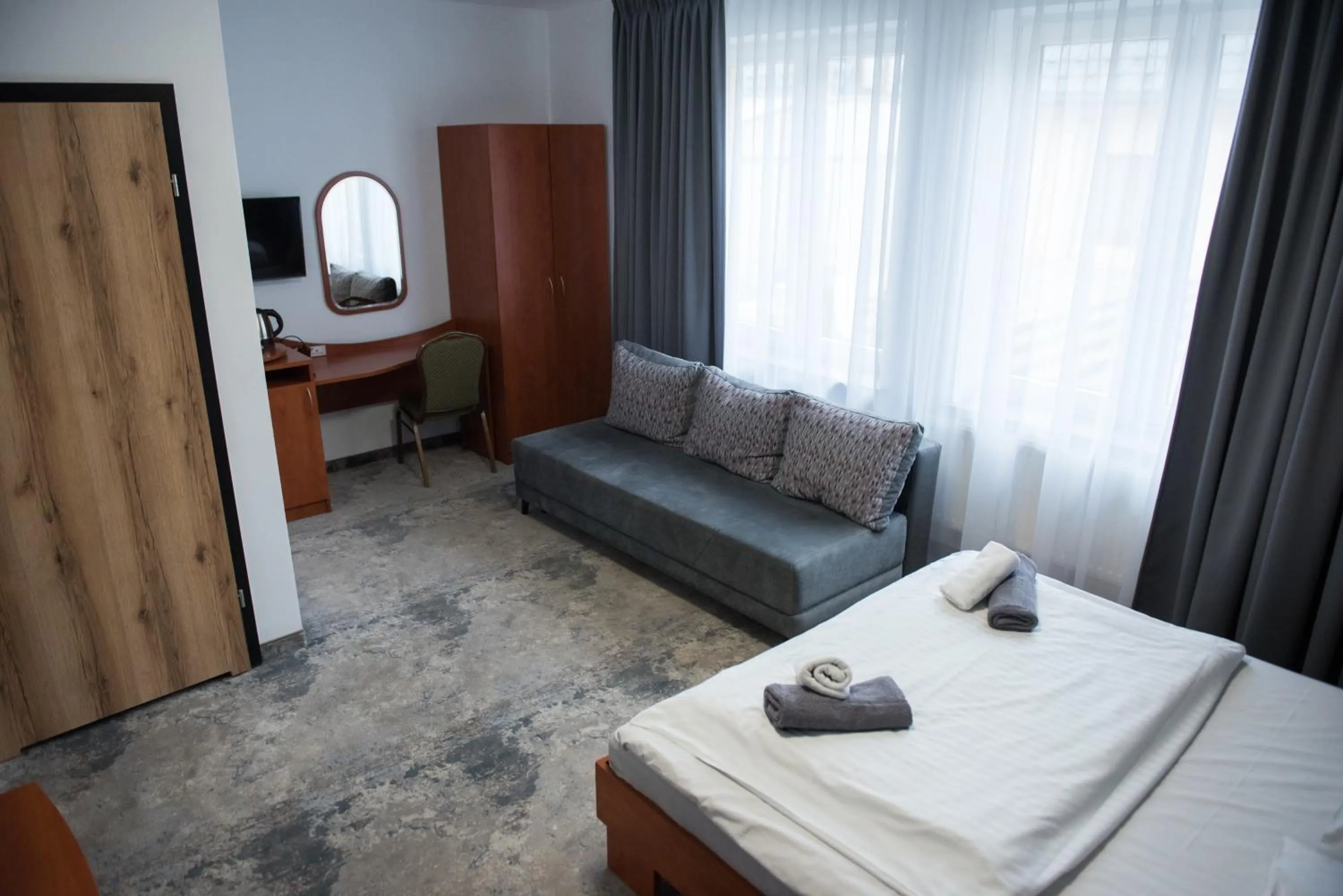 Living room, Bed in Hotel Paradiso