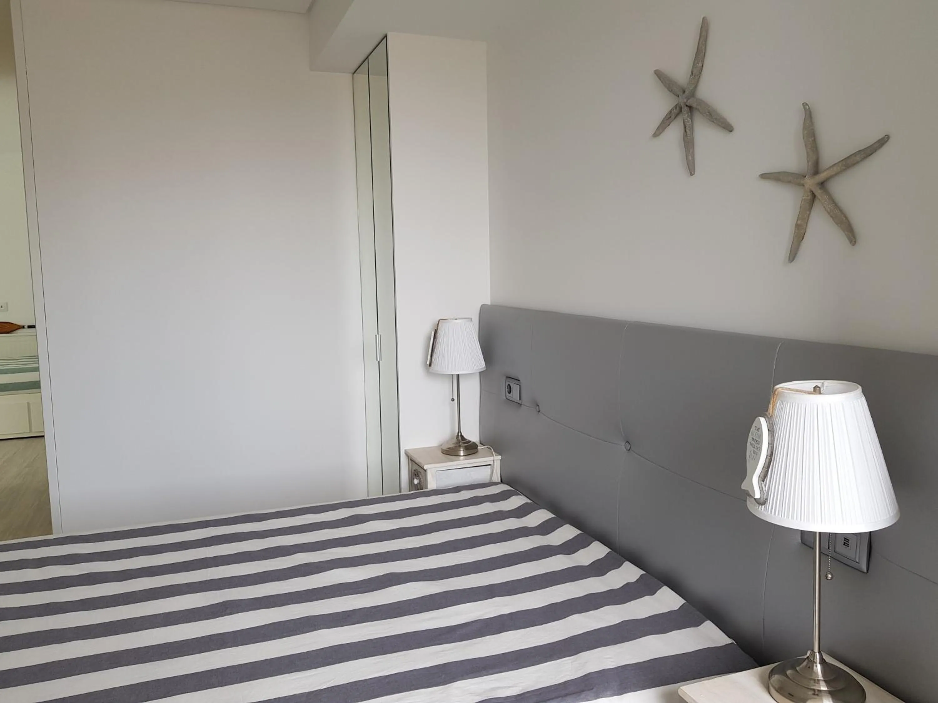 Bed in Blue Sea Apartment