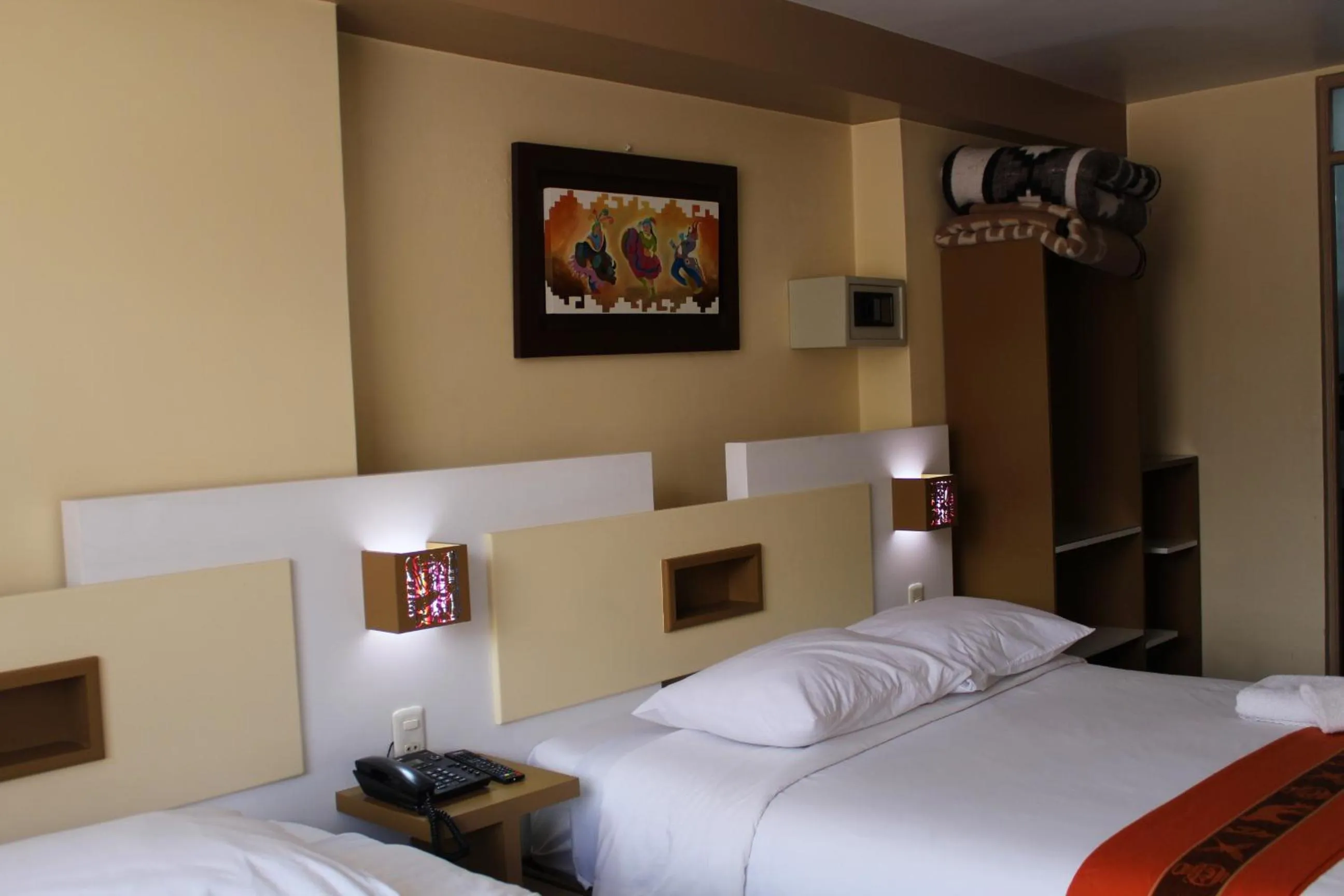 Bed in Kaaro Hotel Puno