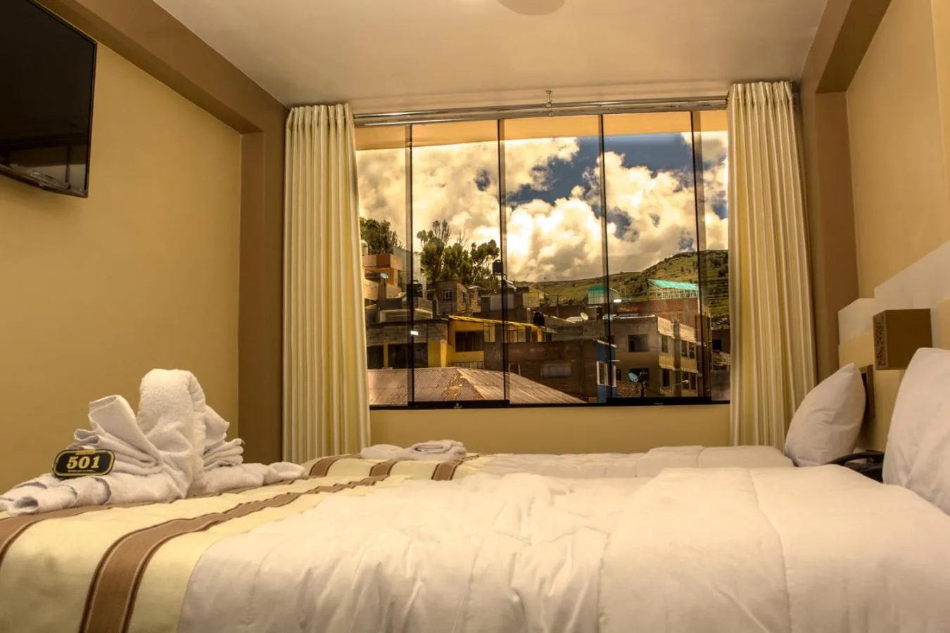 Bed in Kaaro Hotel Puno