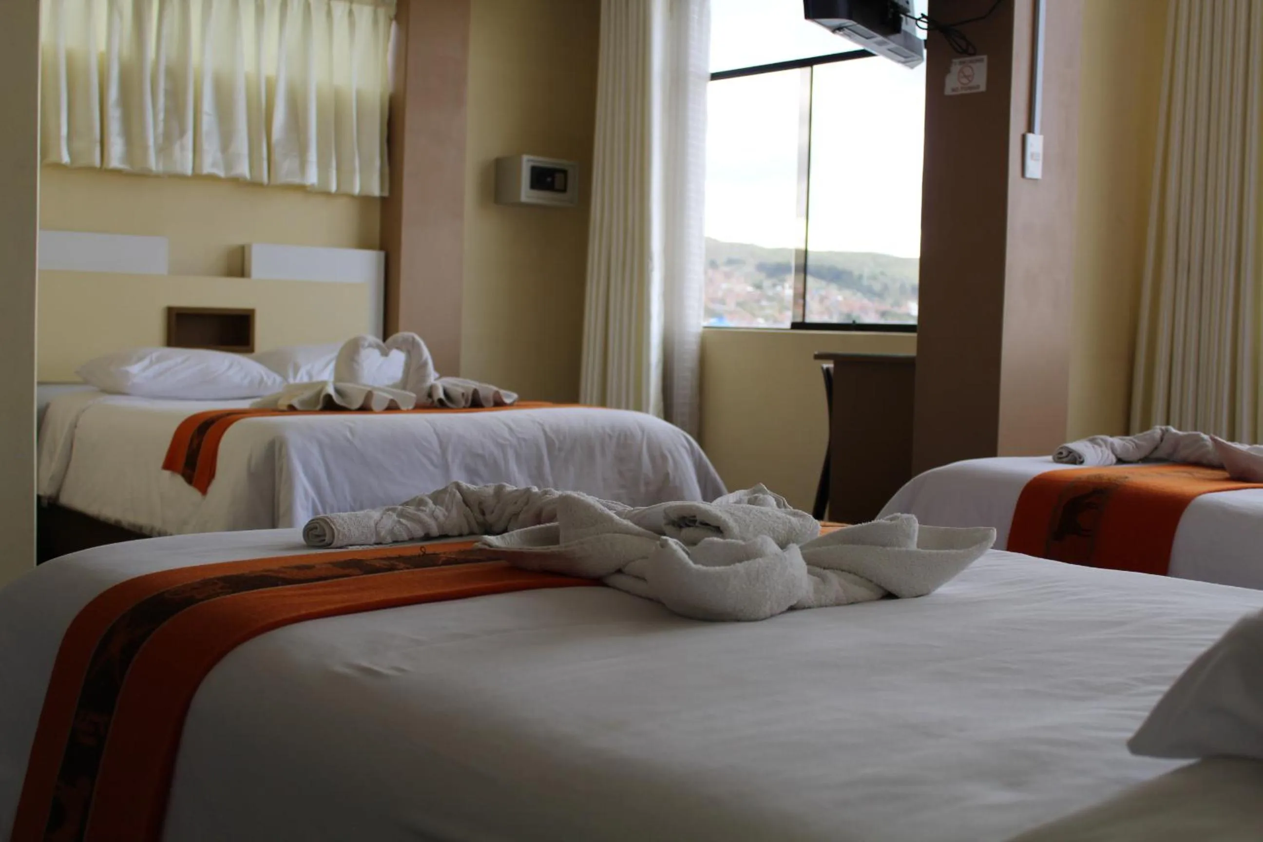 Bed in Kaaro Hotel Puno