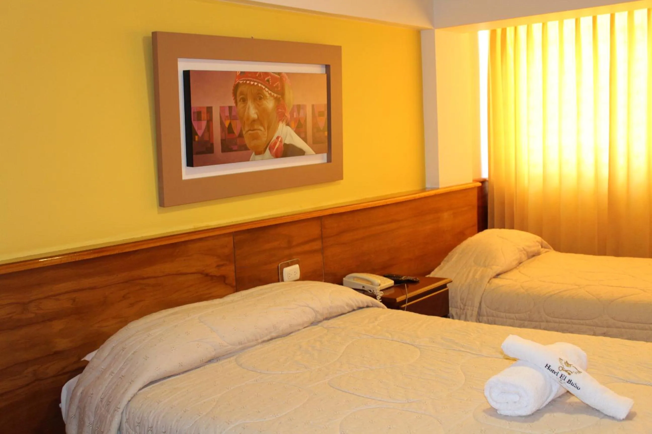 Bed in Kaaro Hotel Puno