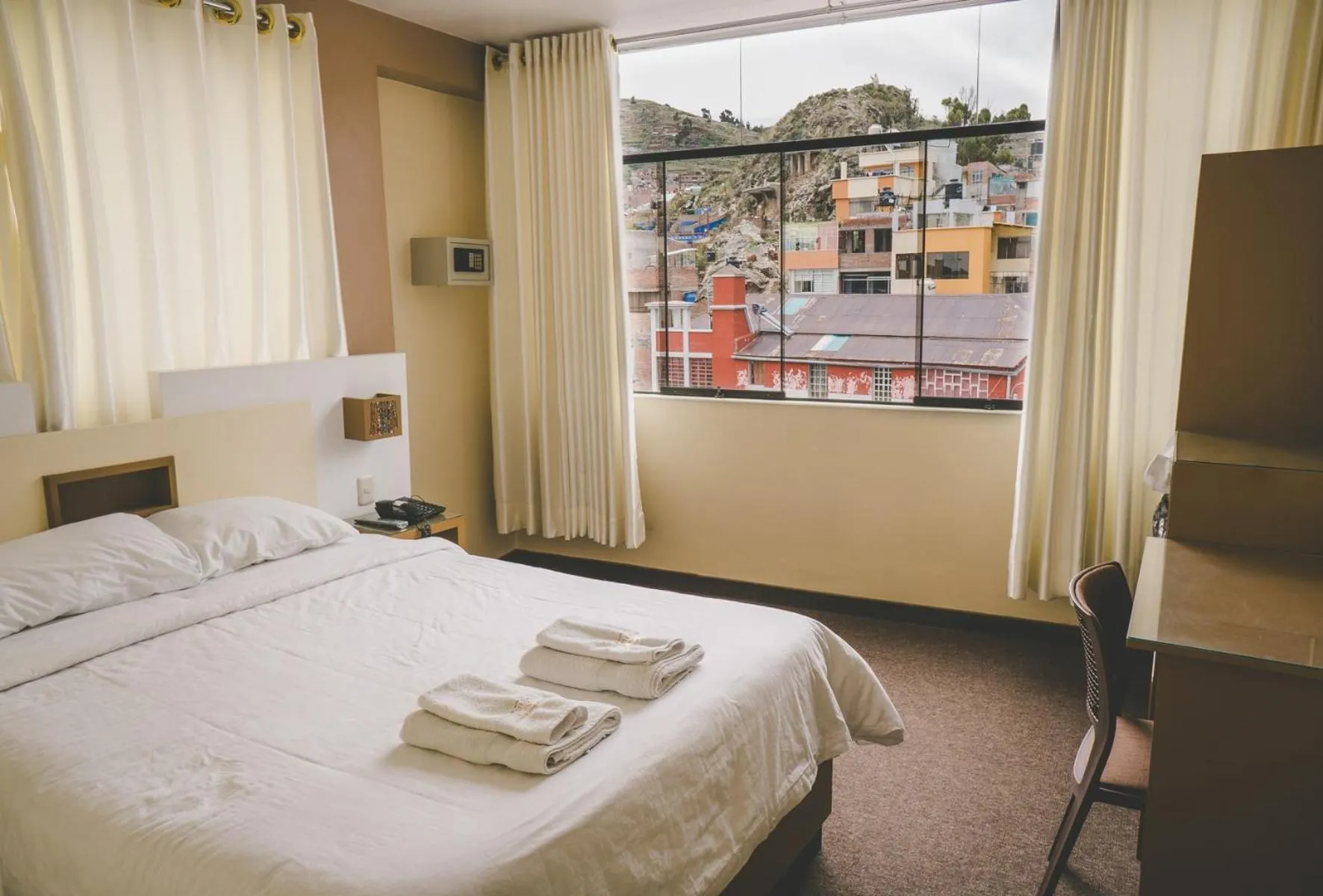 Bed in Kaaro Hotel Puno