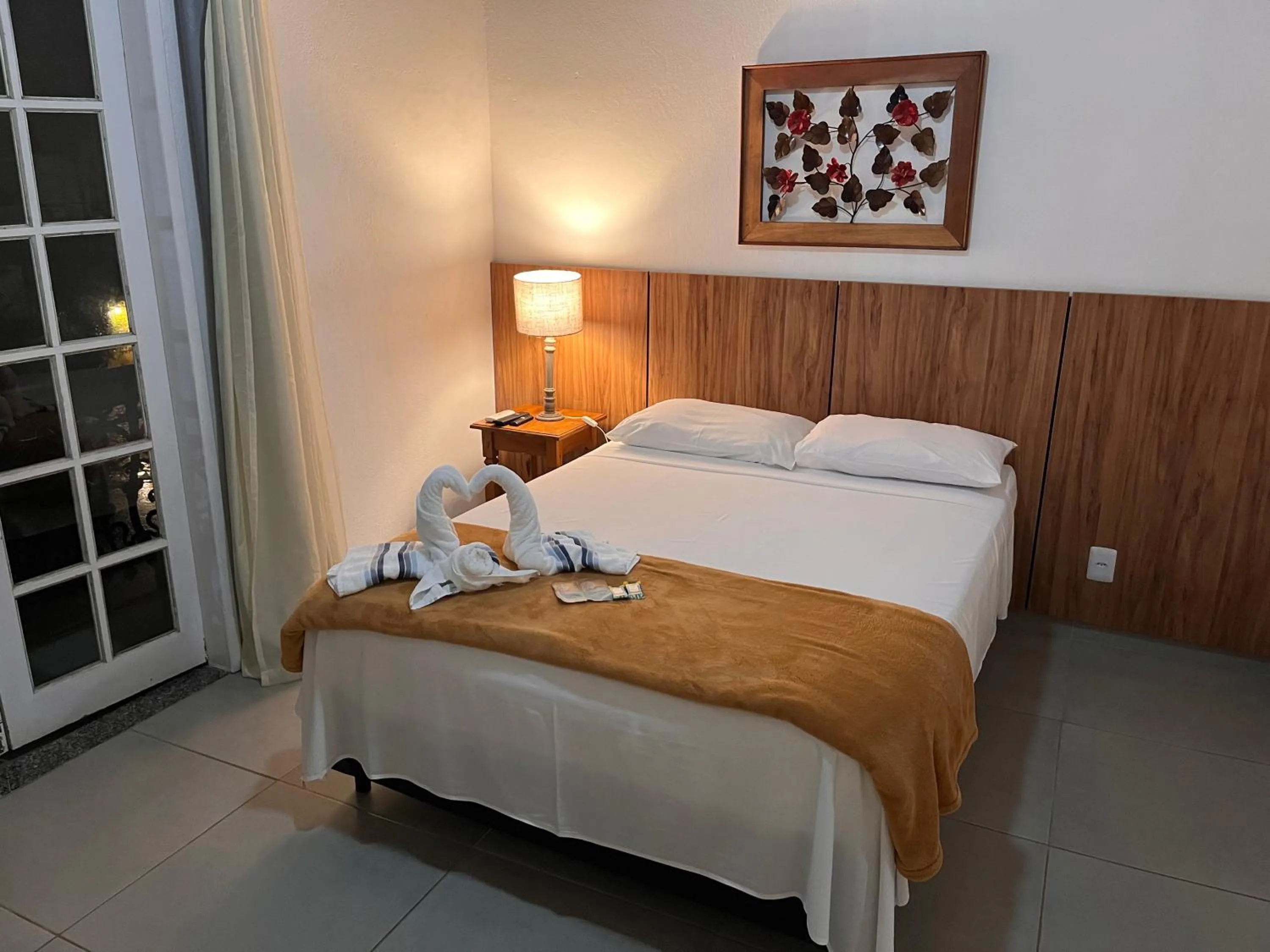 Photo of the whole room, Bed in Pousada Portal de Paraty- COM GERADOR DE ENERGIA