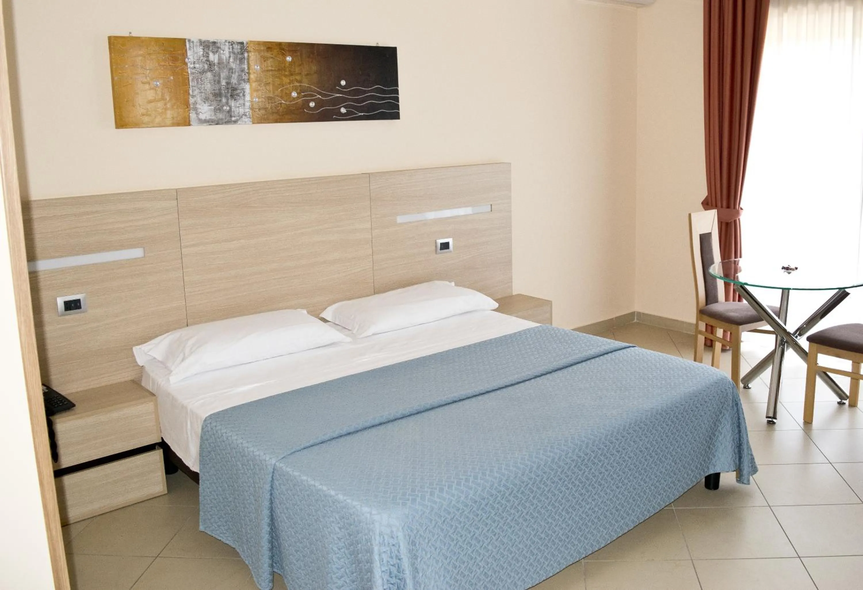 Bed in Hotel The Queen