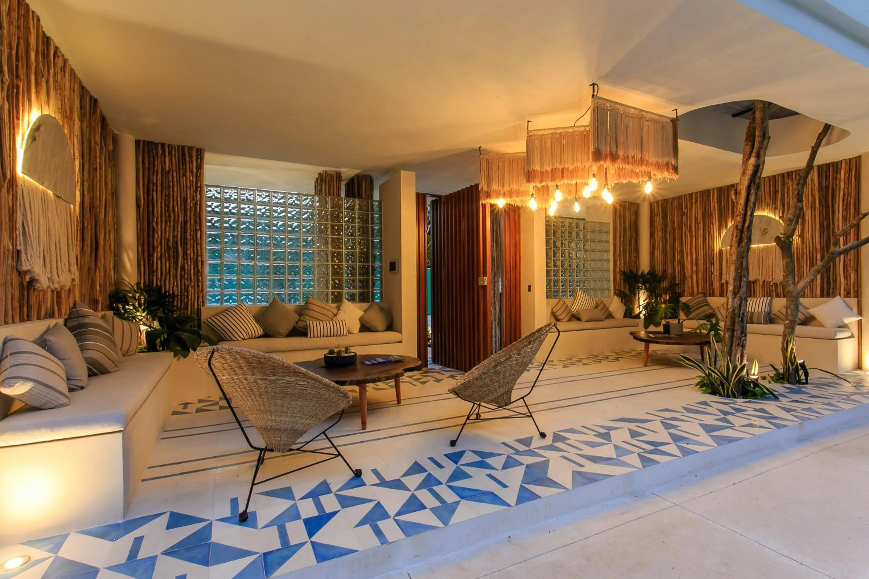 Lobby or reception in Charming Nature-Inspired Condos with Sultry Surroundings by Stella Rentals