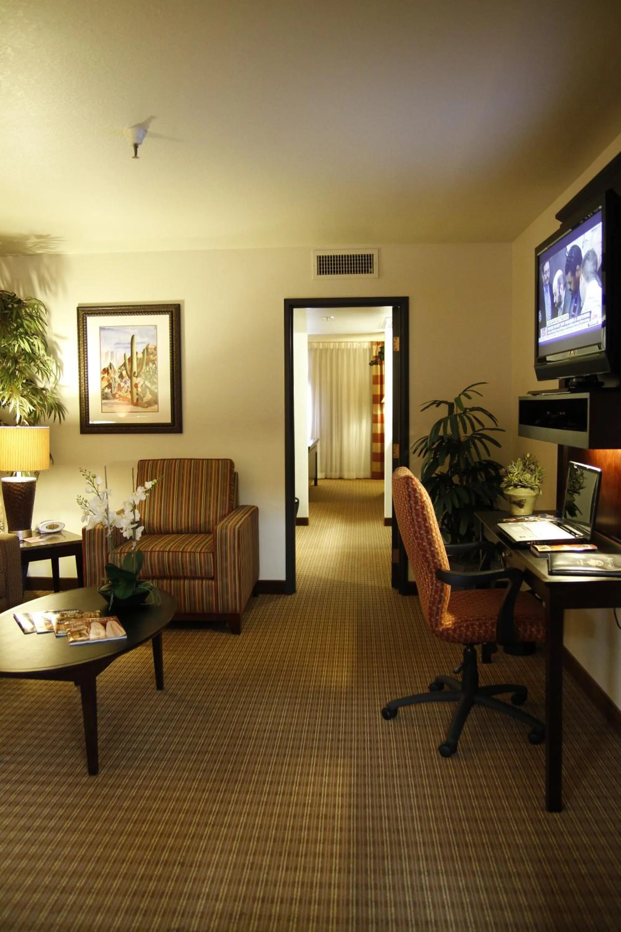 Seating area in Ramada by Wyndham Viscount Suites Tucson East
