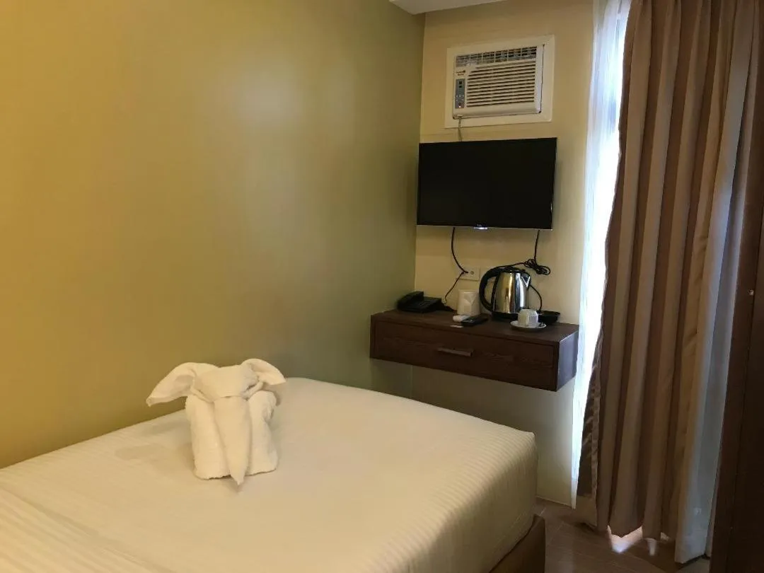 Bedroom, Bed in Treasure Island Hotel With Mini Water Adventure