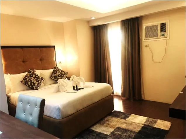 Bedroom, Bed in Treasure Island Hotel With Mini Water Adventure