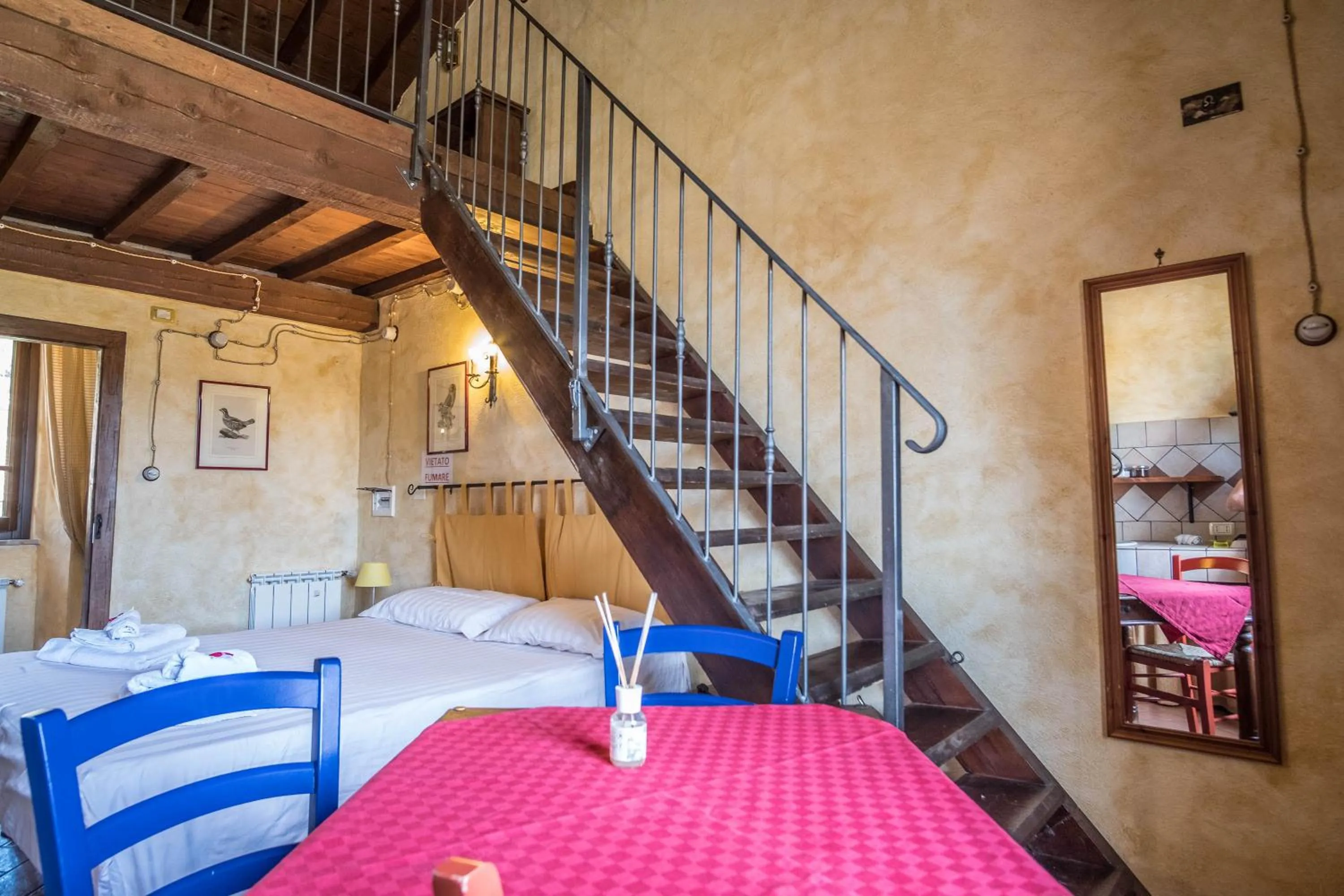 Living room, Bed in Agriturismo Goccia di Luna