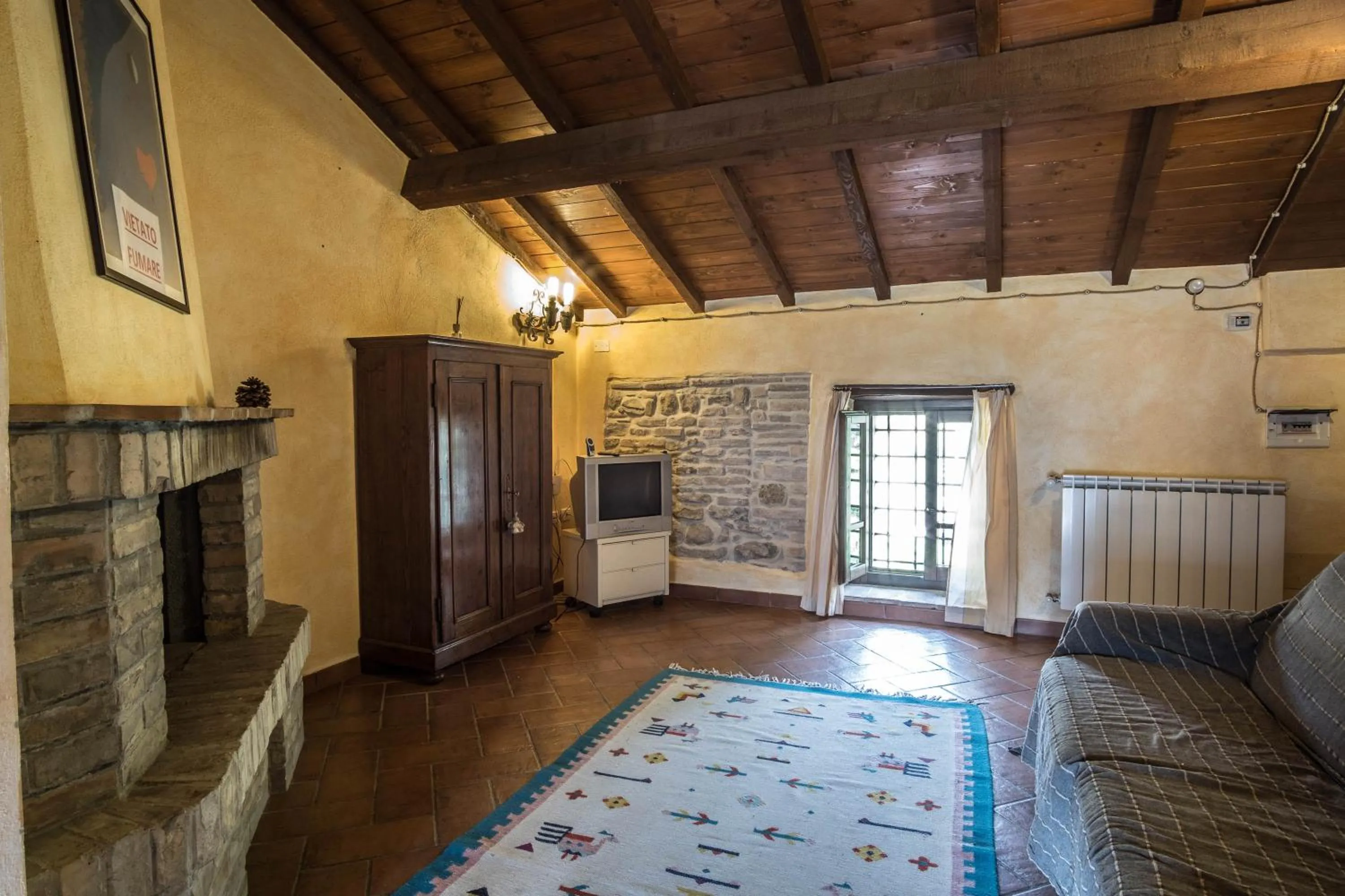 Living room, Bed in Agriturismo Goccia di Luna