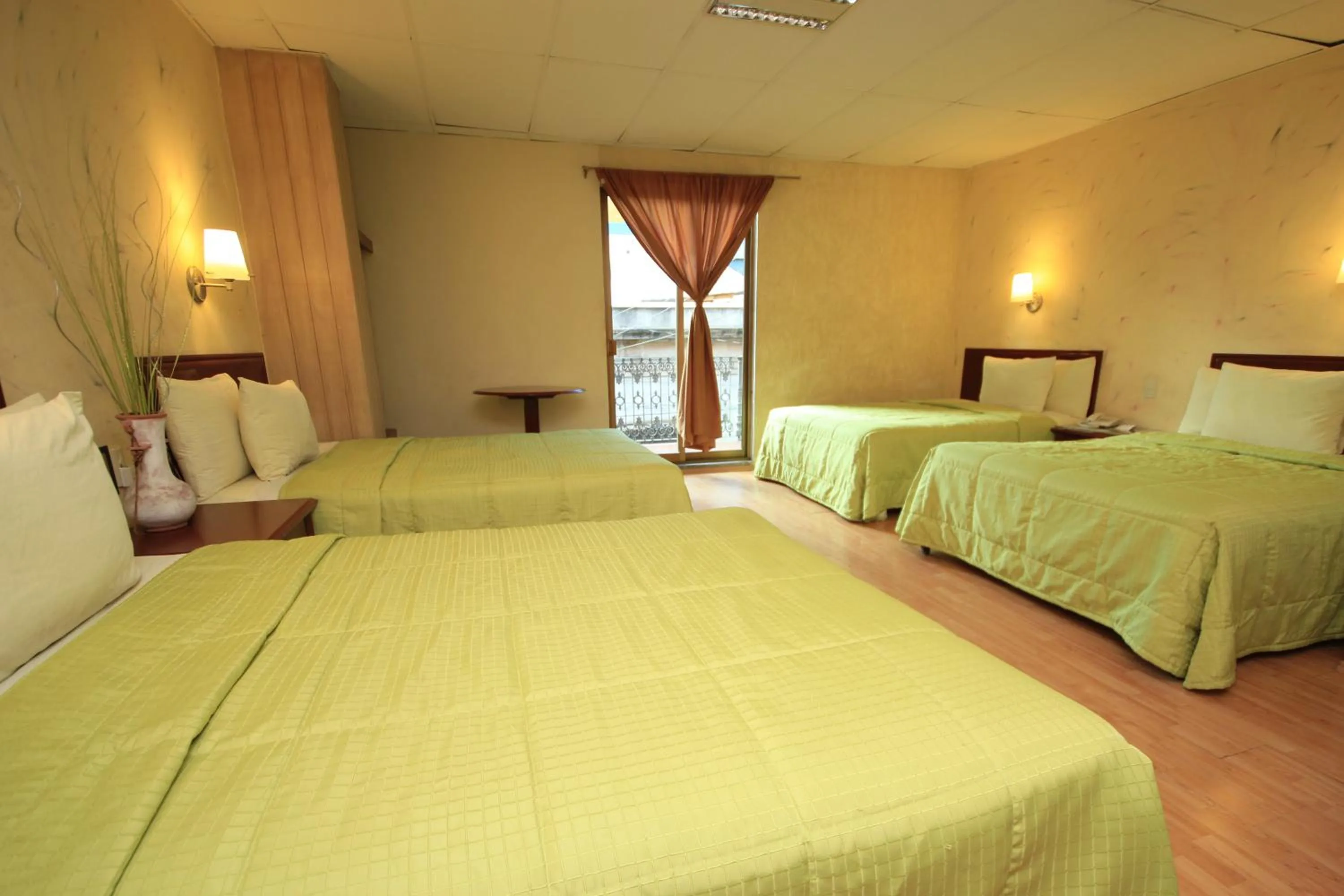 Bed in Hotel Enterprise Inn Plaza