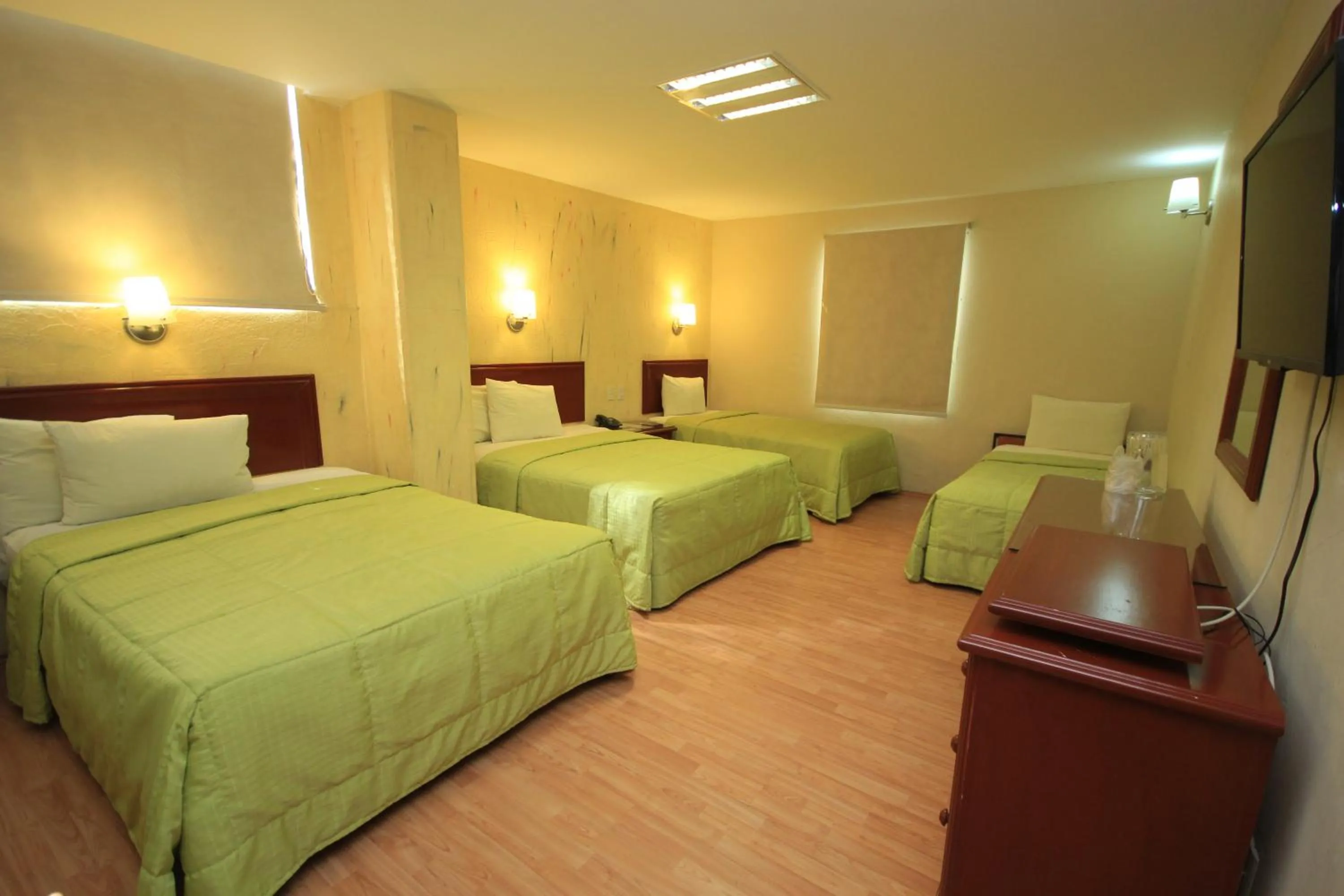 Bed in Hotel Enterprise Inn Plaza