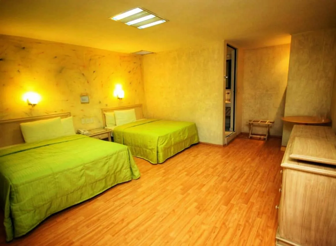 Bed in Hotel Enterprise Inn Plaza