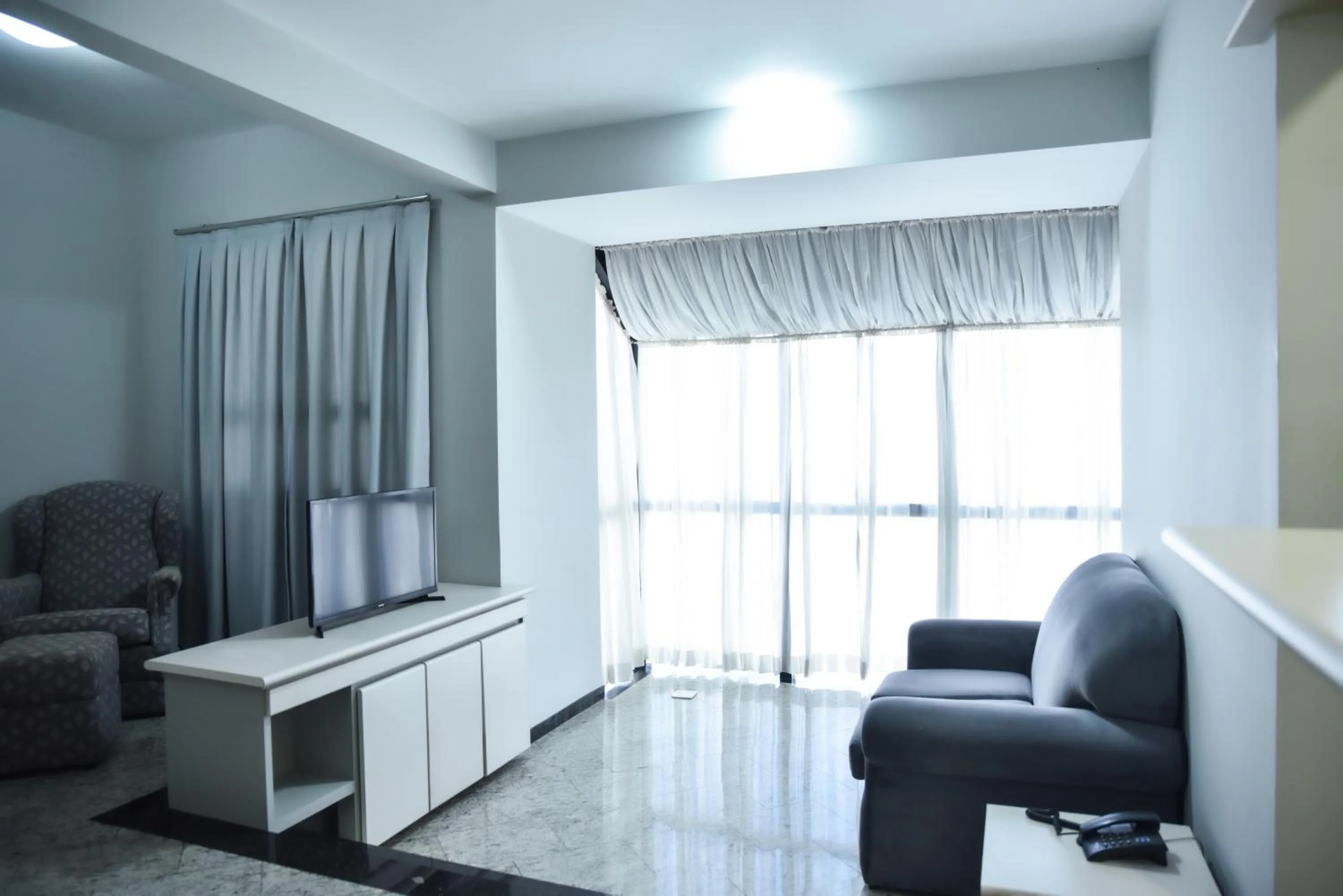 Living room in Plaza Inn Small Town Flat