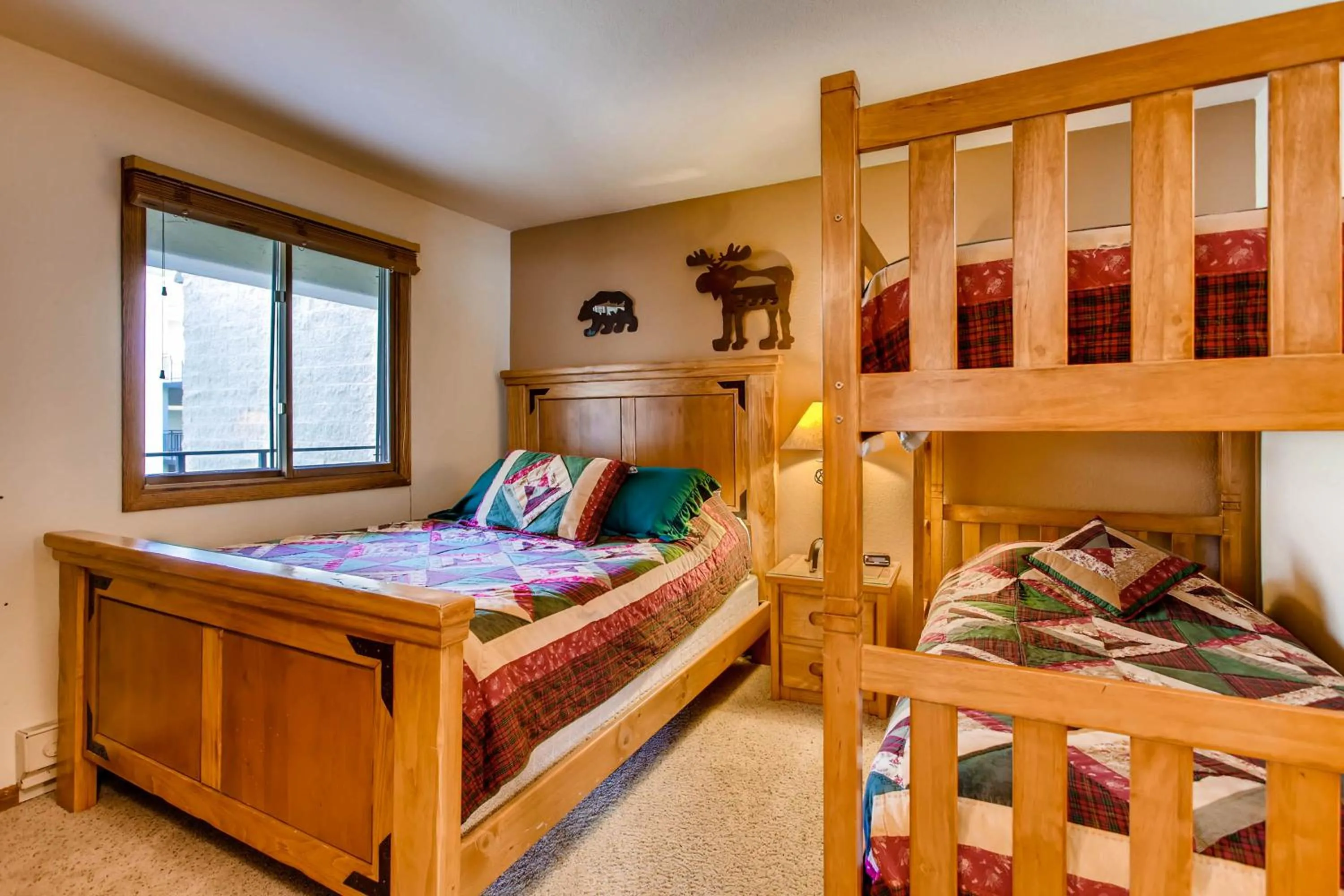 Bed in The Plaza Condominiums by Crested Butte Mountain Resort
