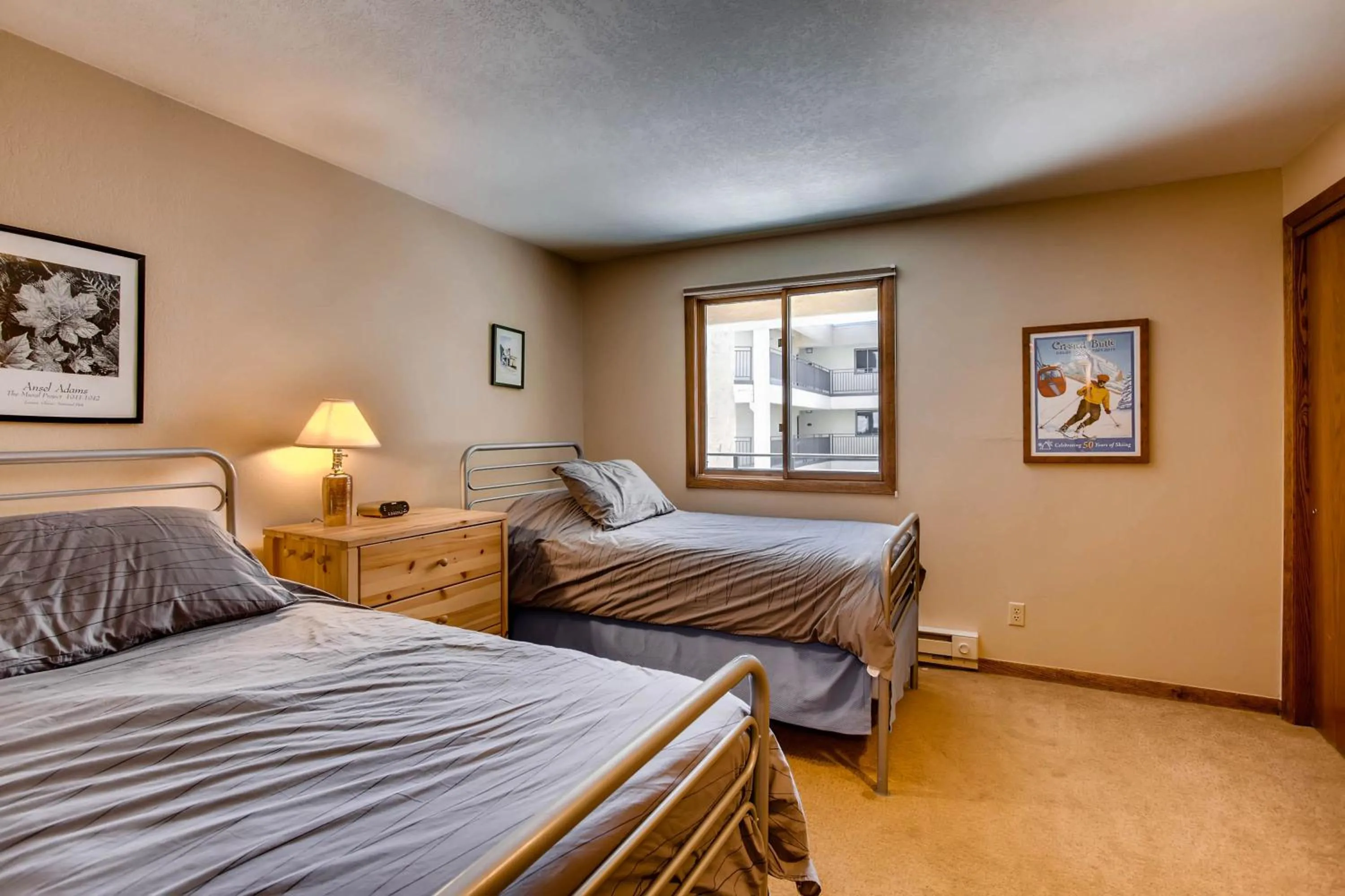 Bed in The Plaza Condominiums by Crested Butte Mountain Resort