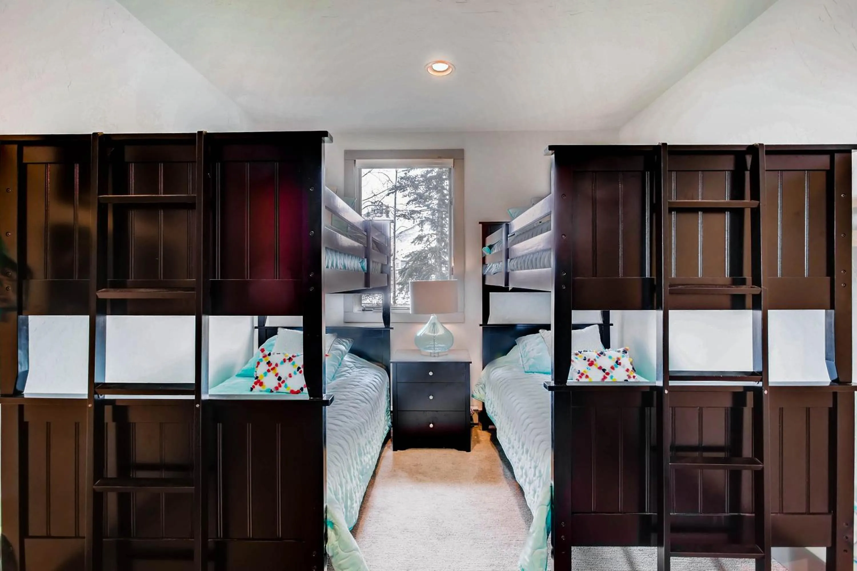 Bed in The Plaza Condominiums by Crested Butte Mountain Resort
