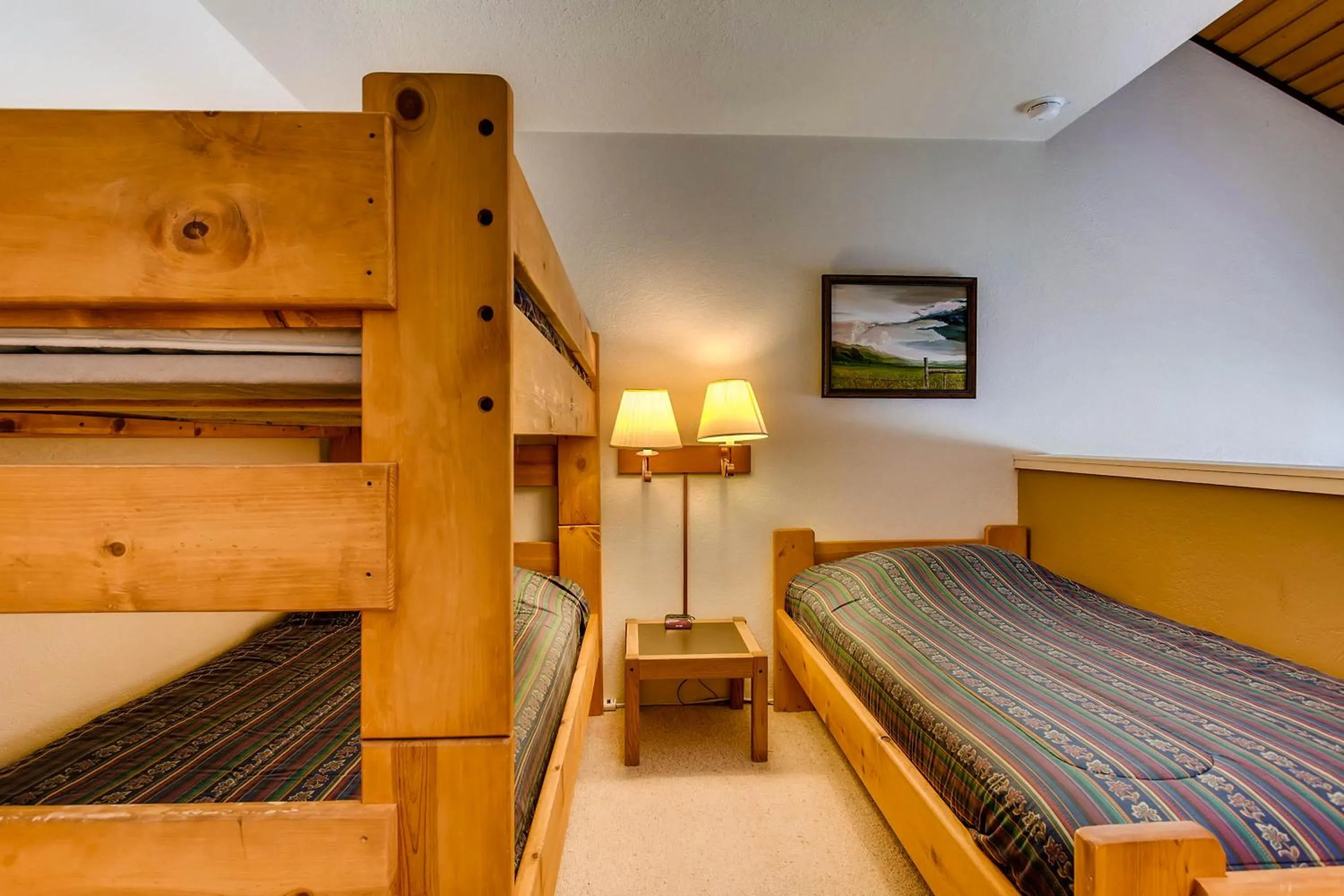Bed in The Plaza Condominiums by Crested Butte Mountain Resort