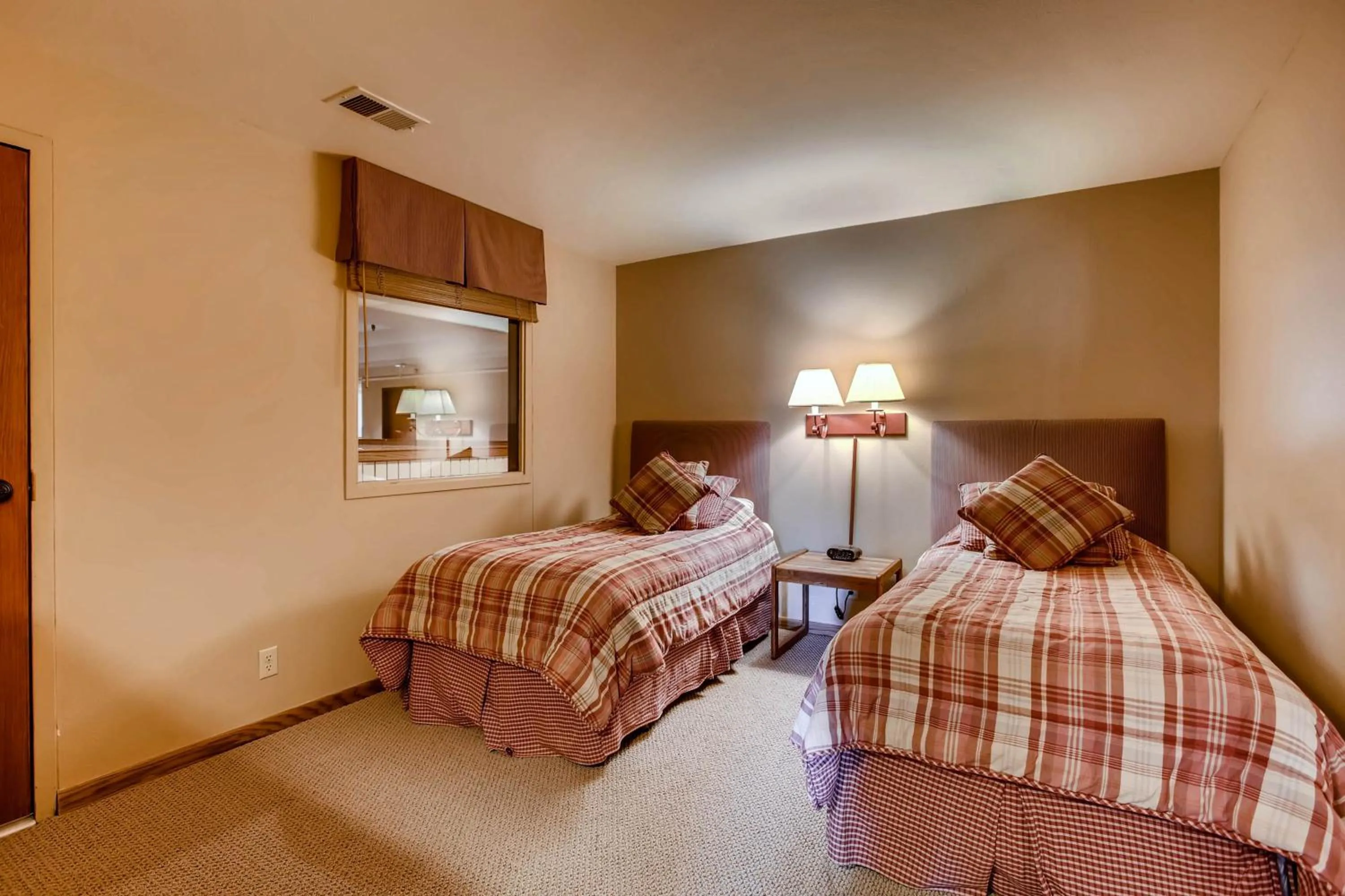 Bed in The Plaza Condominiums by Crested Butte Mountain Resort