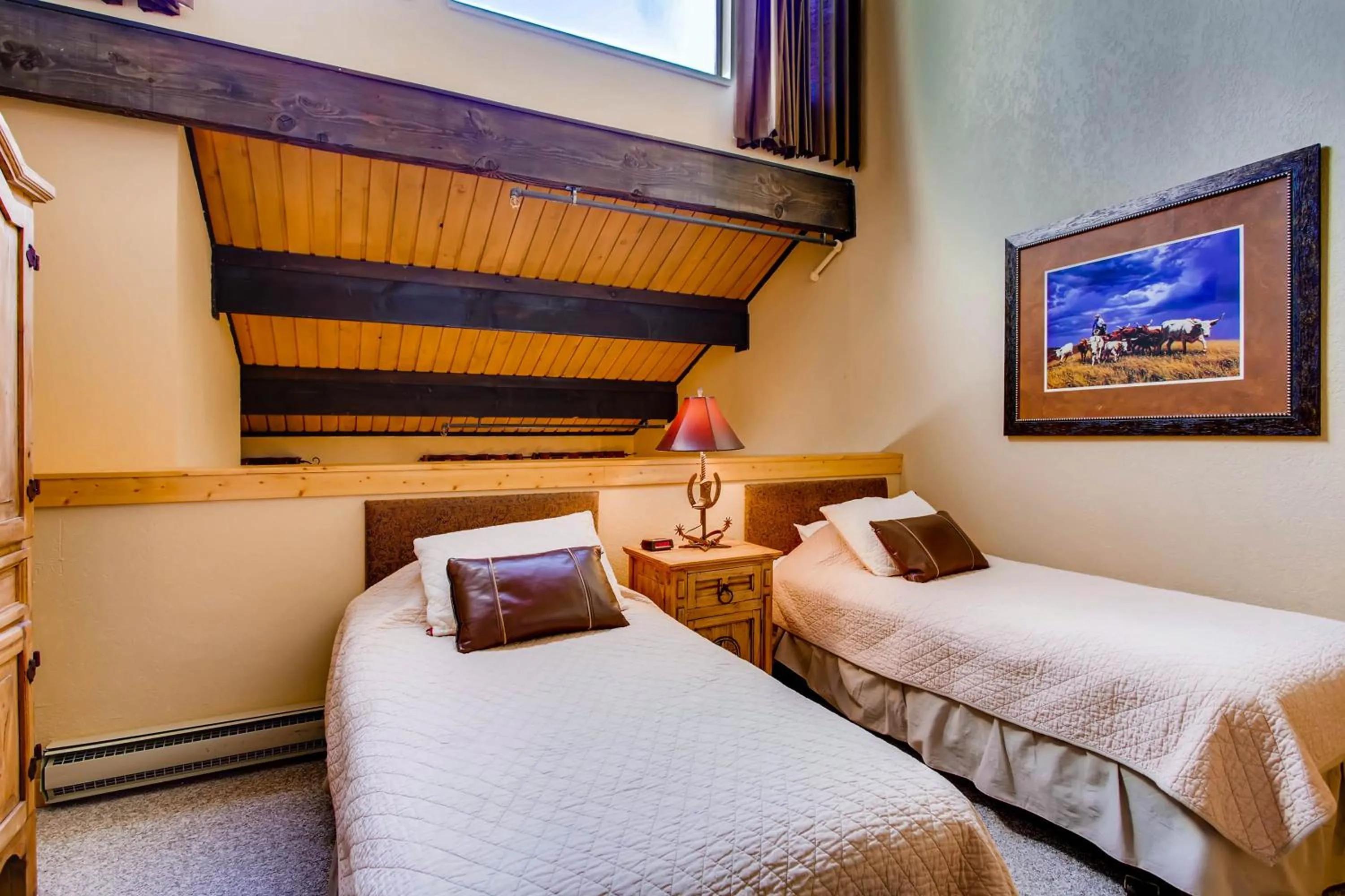 Bed in The Plaza Condominiums by Crested Butte Mountain Resort