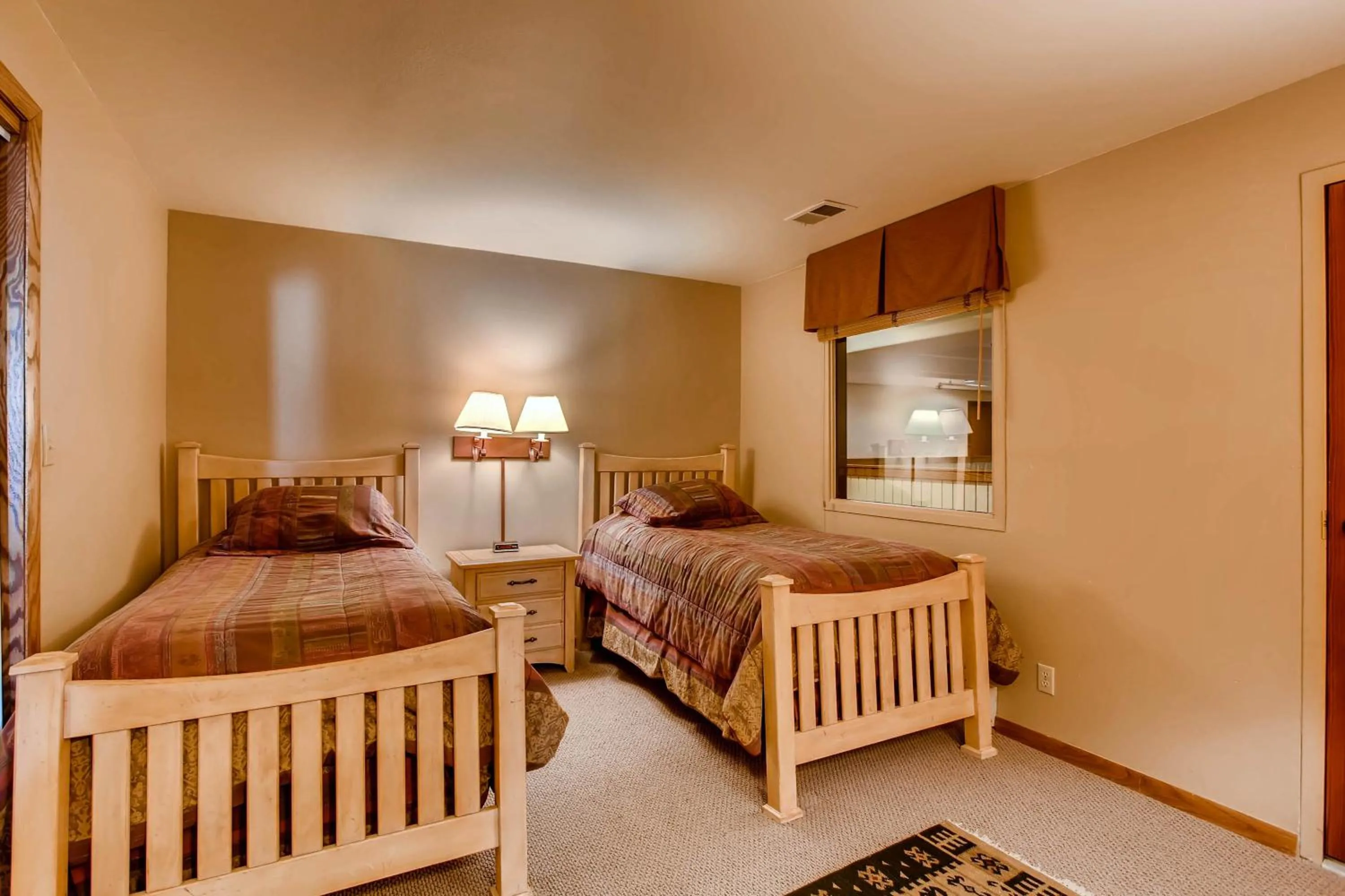 Bed in The Plaza Condominiums by Crested Butte Mountain Resort