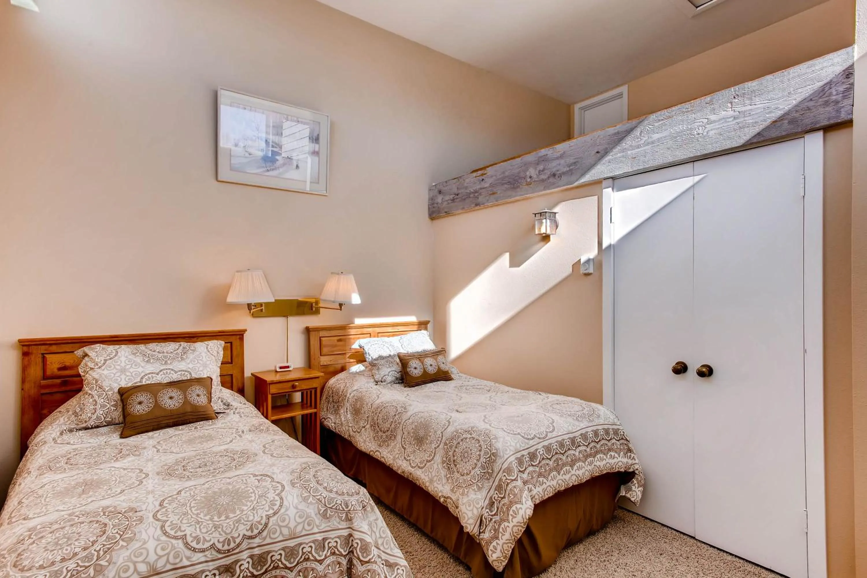 Bed in The Plaza Condominiums by Crested Butte Mountain Resort