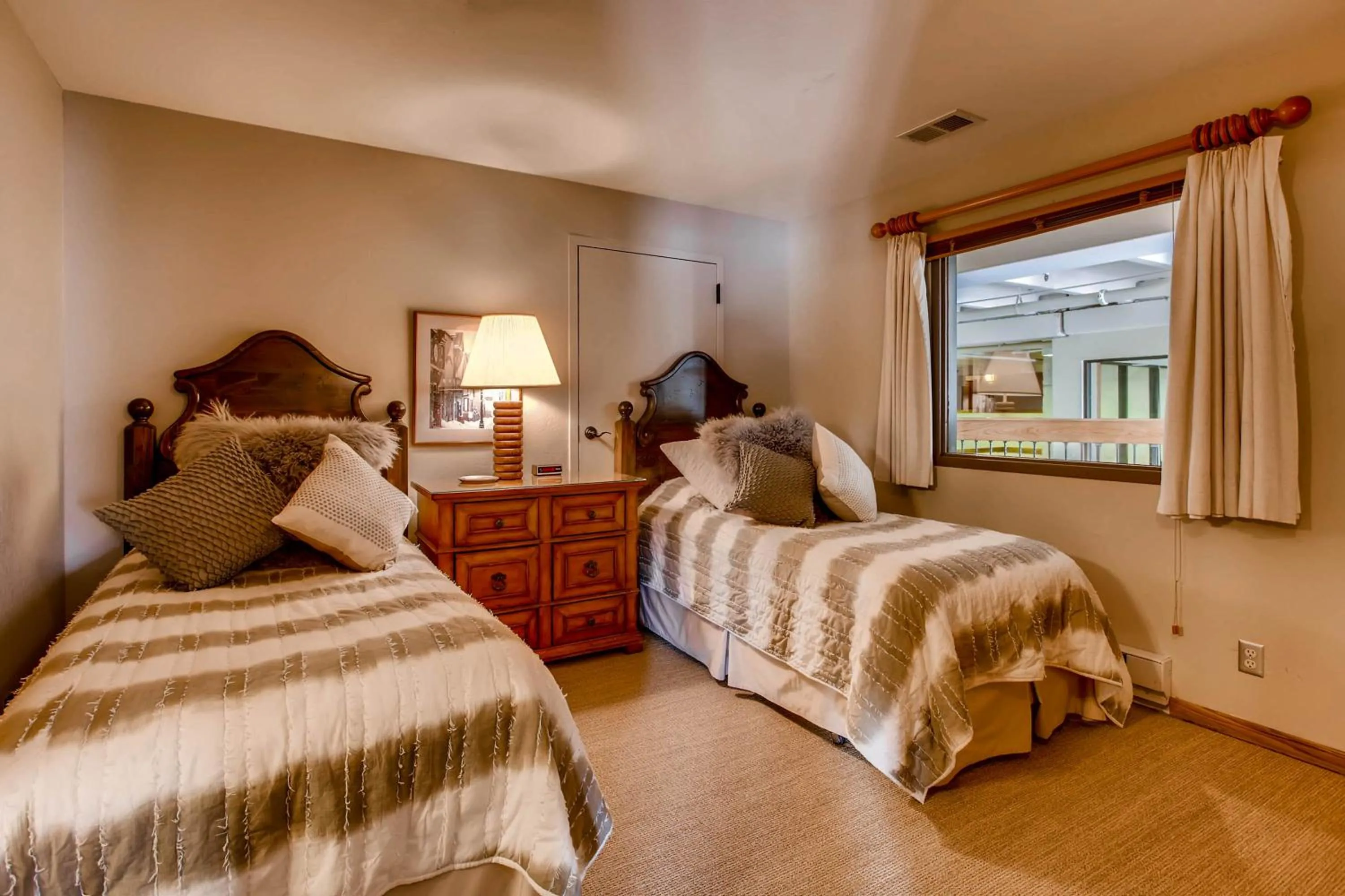 Bed in The Plaza Condominiums by Crested Butte Mountain Resort
