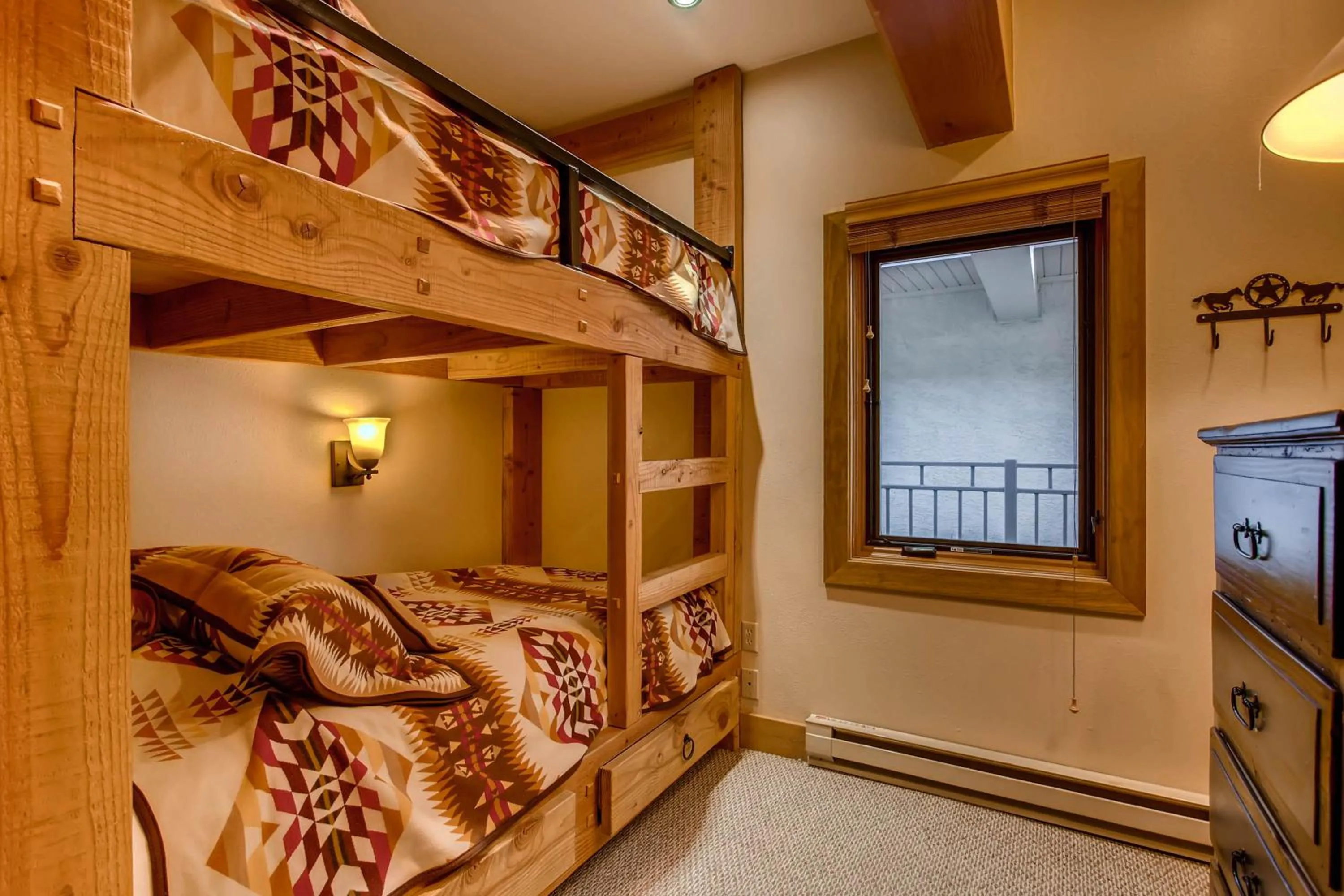 Bed in The Plaza Condominiums by Crested Butte Mountain Resort