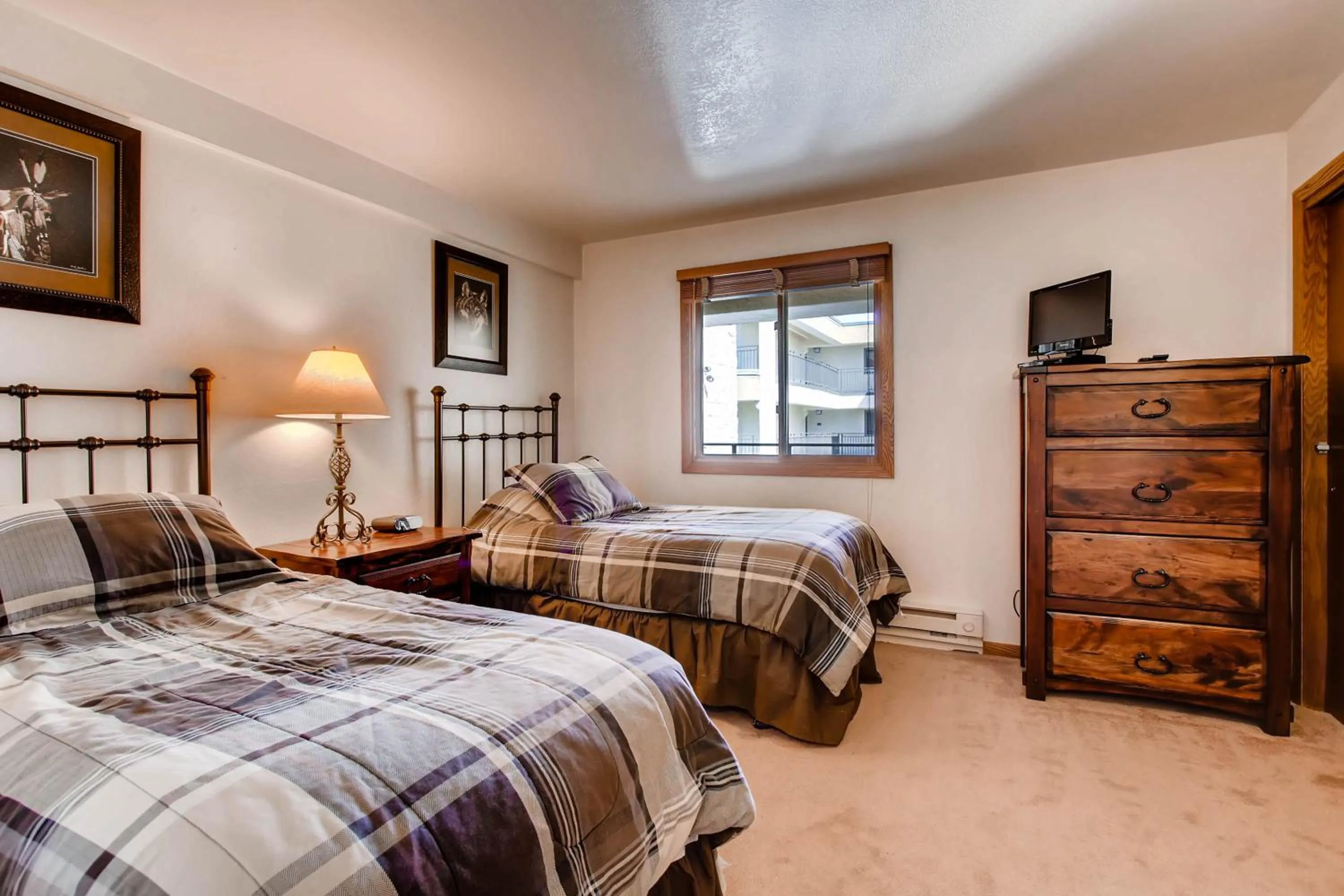 Bed in The Plaza Condominiums by Crested Butte Mountain Resort