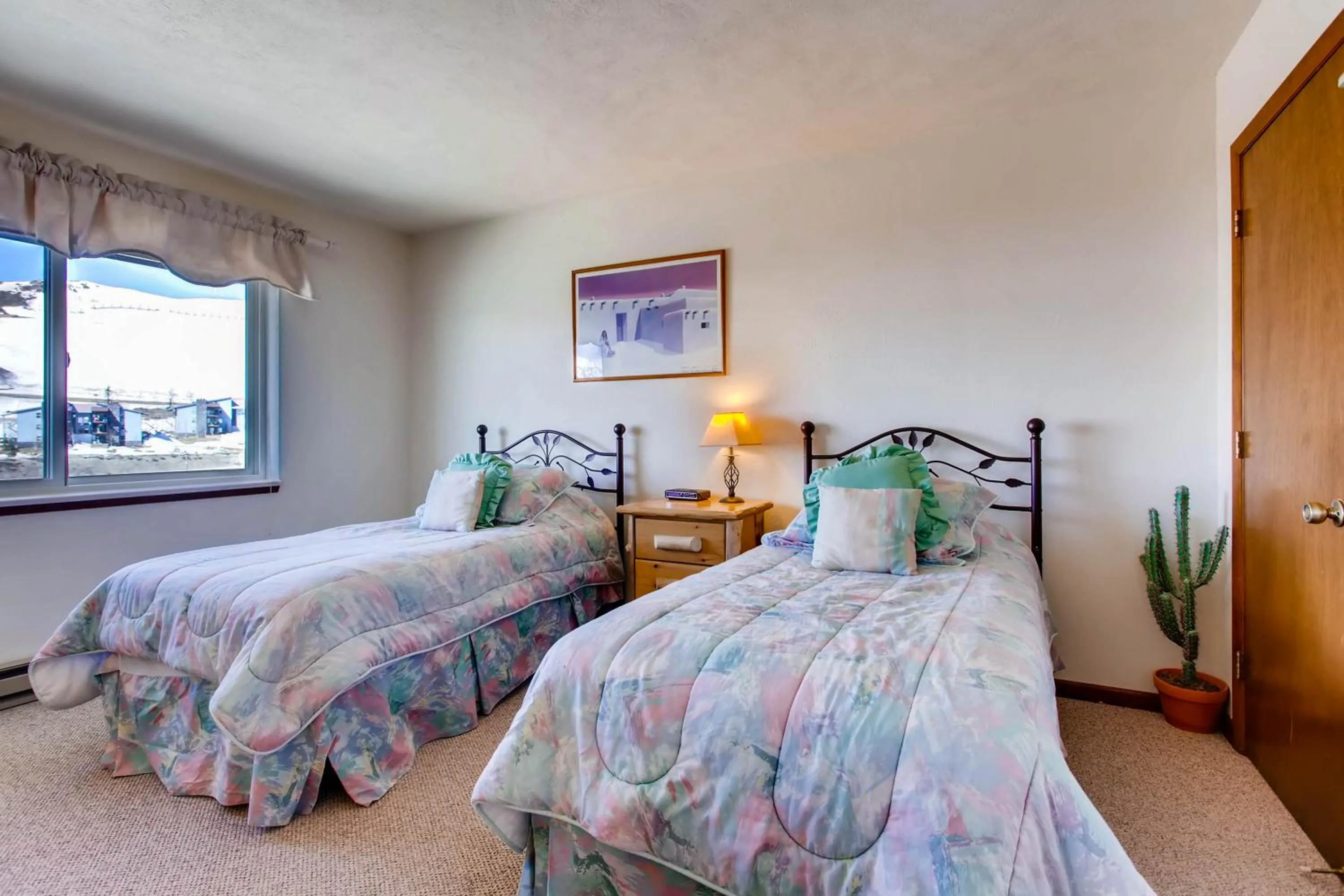 Bed in The Plaza Condominiums by Crested Butte Mountain Resort