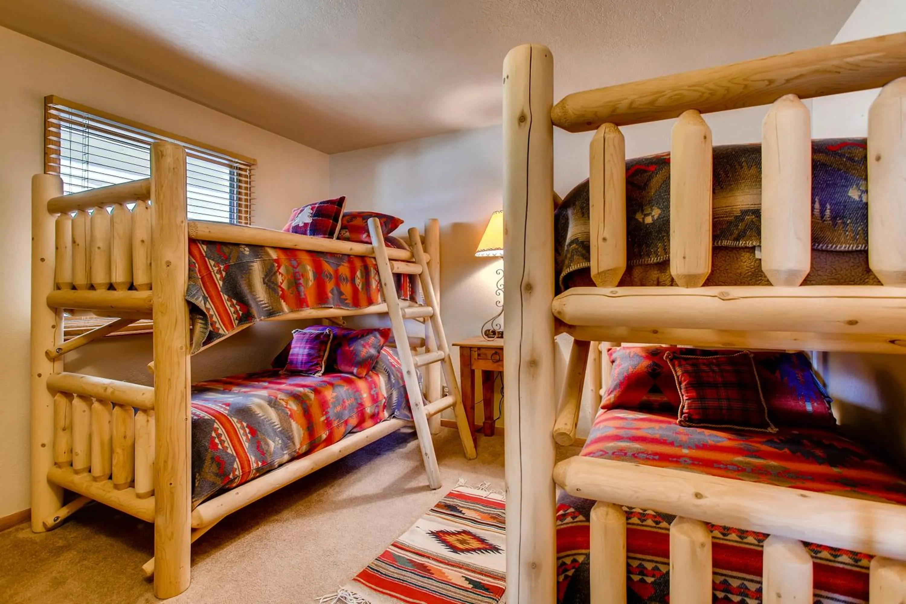 Bed in The Plaza Condominiums by Crested Butte Mountain Resort